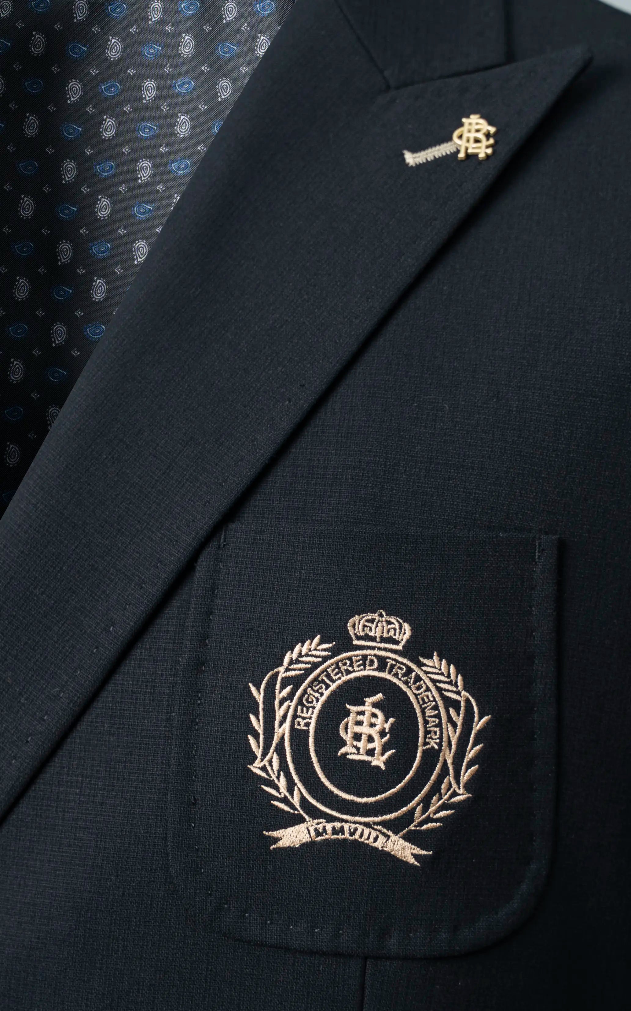 Double-breasted with peak lapels Black