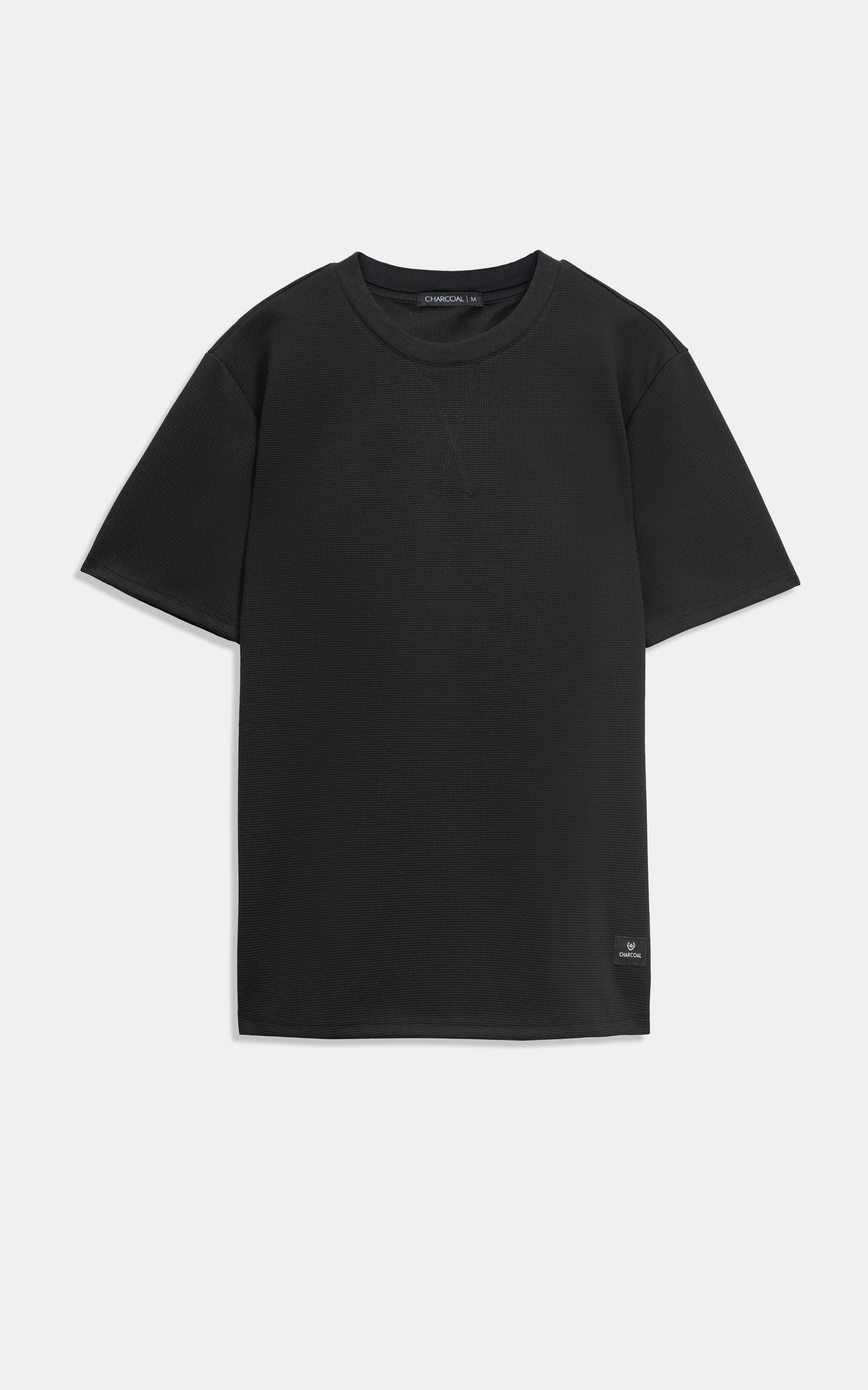 Black oversize crew neck T-shirt, front view, short sleeves and straight hem