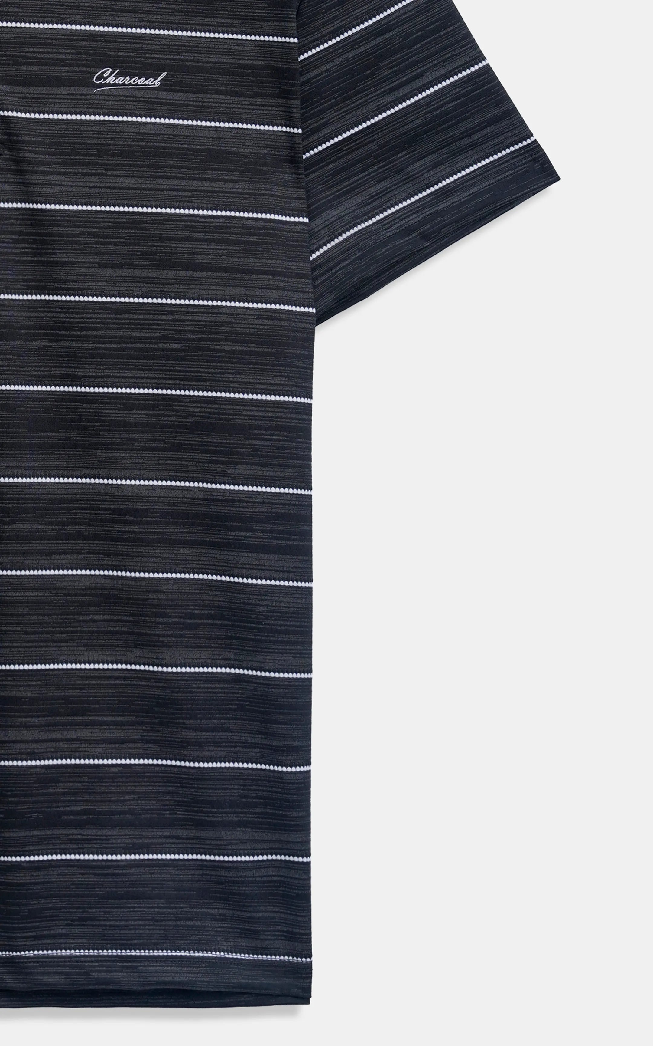 Black striped polo shirt fabric detail with horizontal light stripes and stitched hem