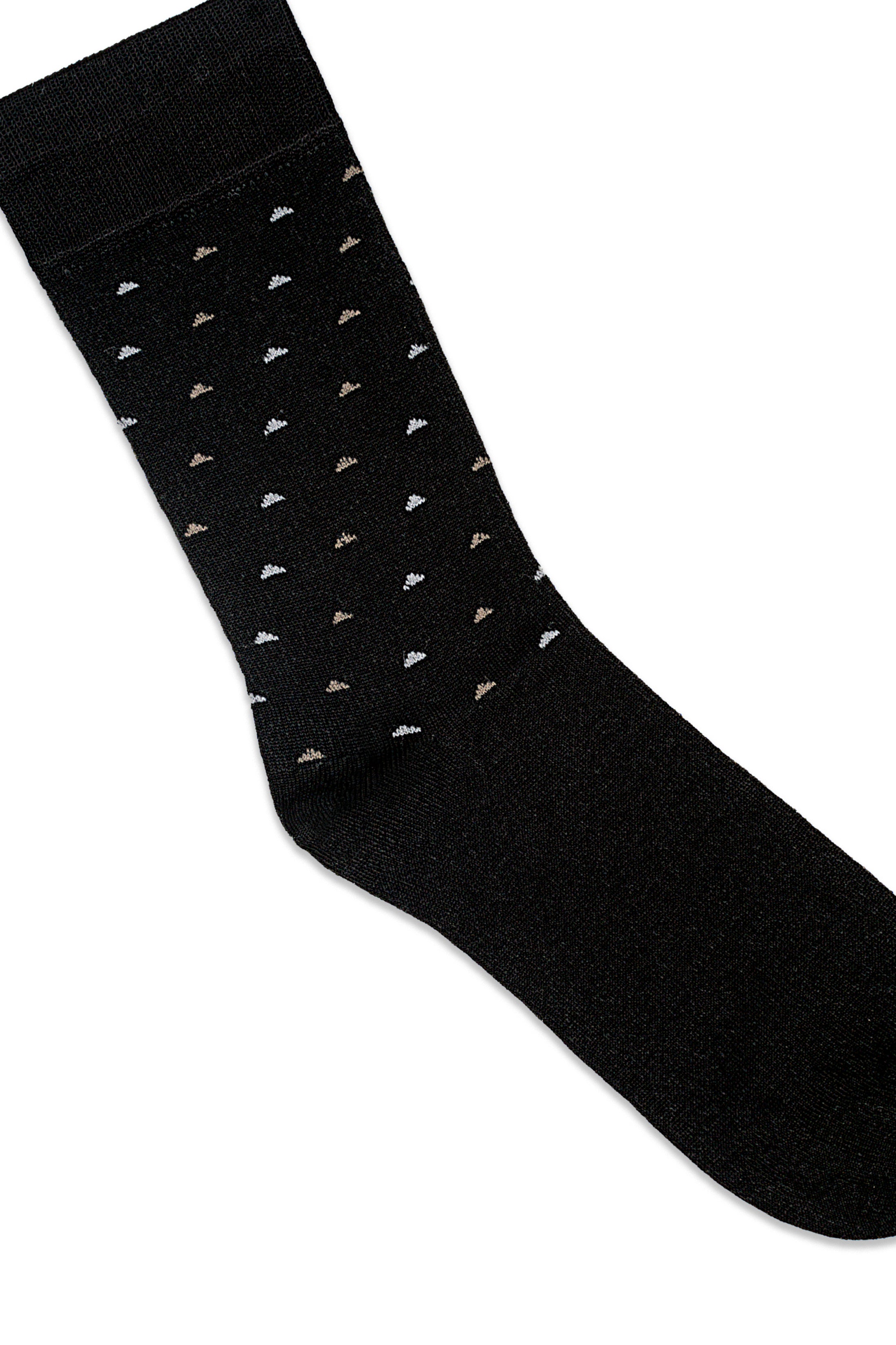 Black dress sock close-up with small repeated icon pattern