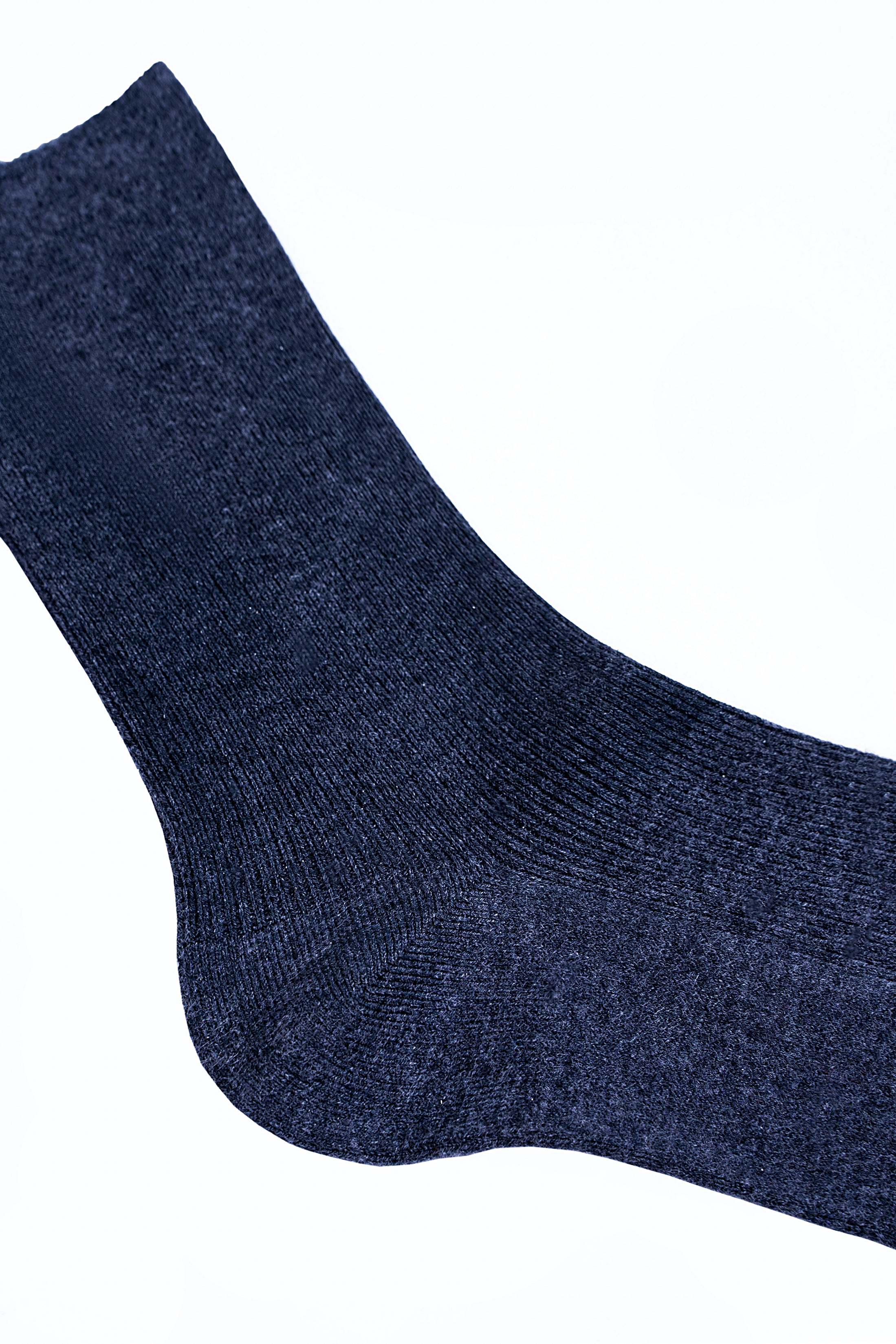 Navy wool sock close-up of ribbed knit and seam at toe