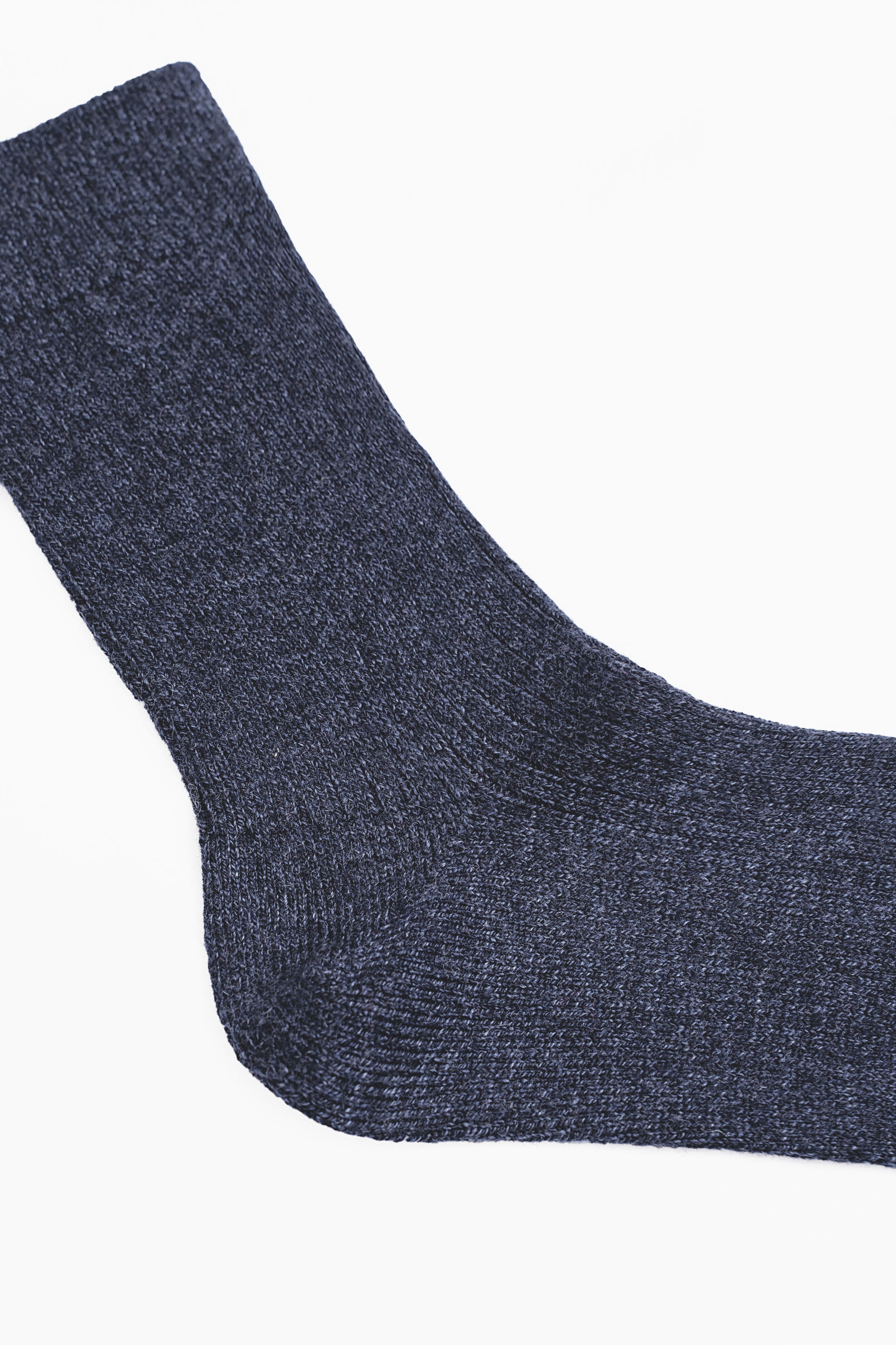 Dark blue wool sock, ribbed knit cuff and smooth toe
