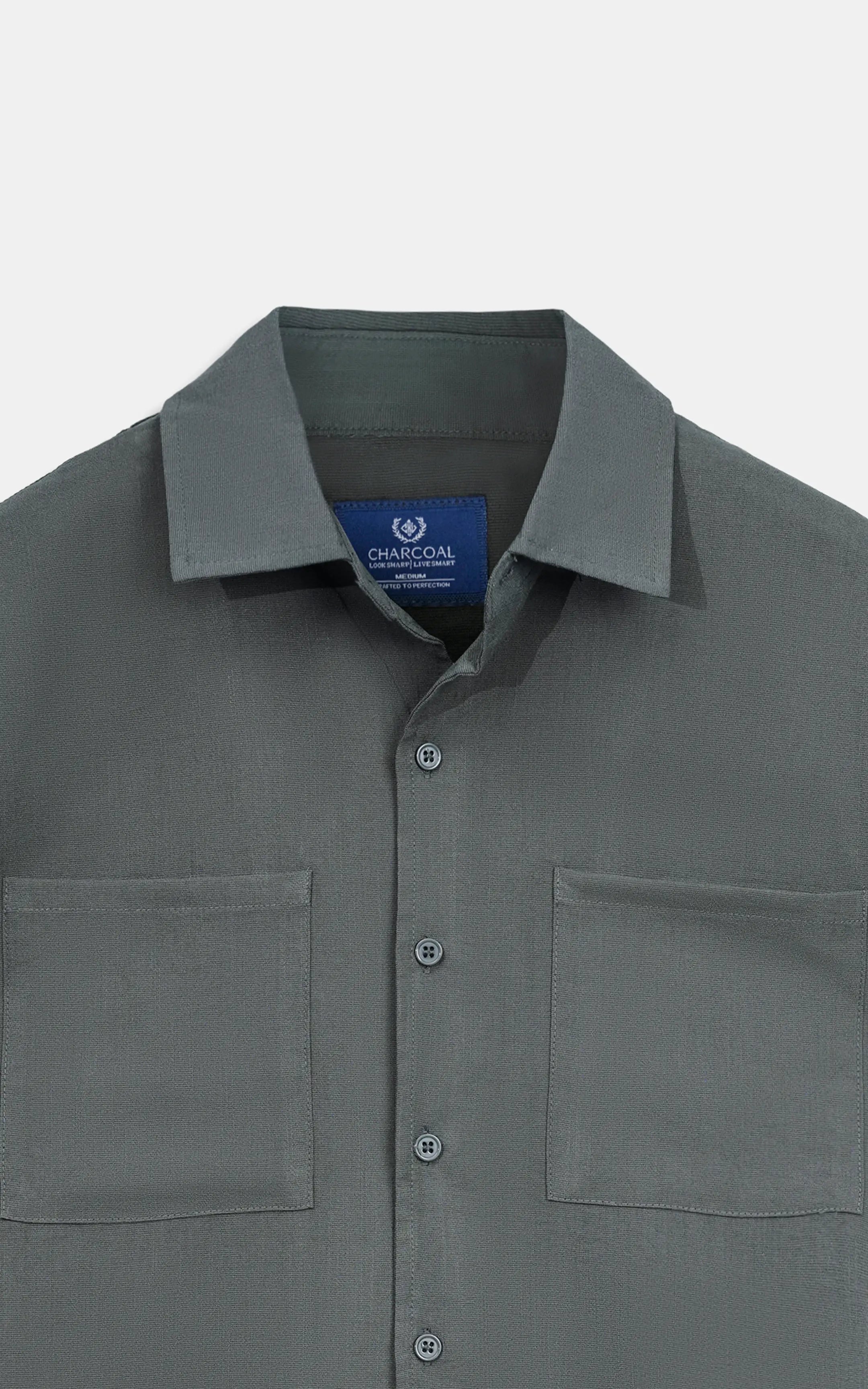 Dark grey casual shirt close-up of regular collar and button front