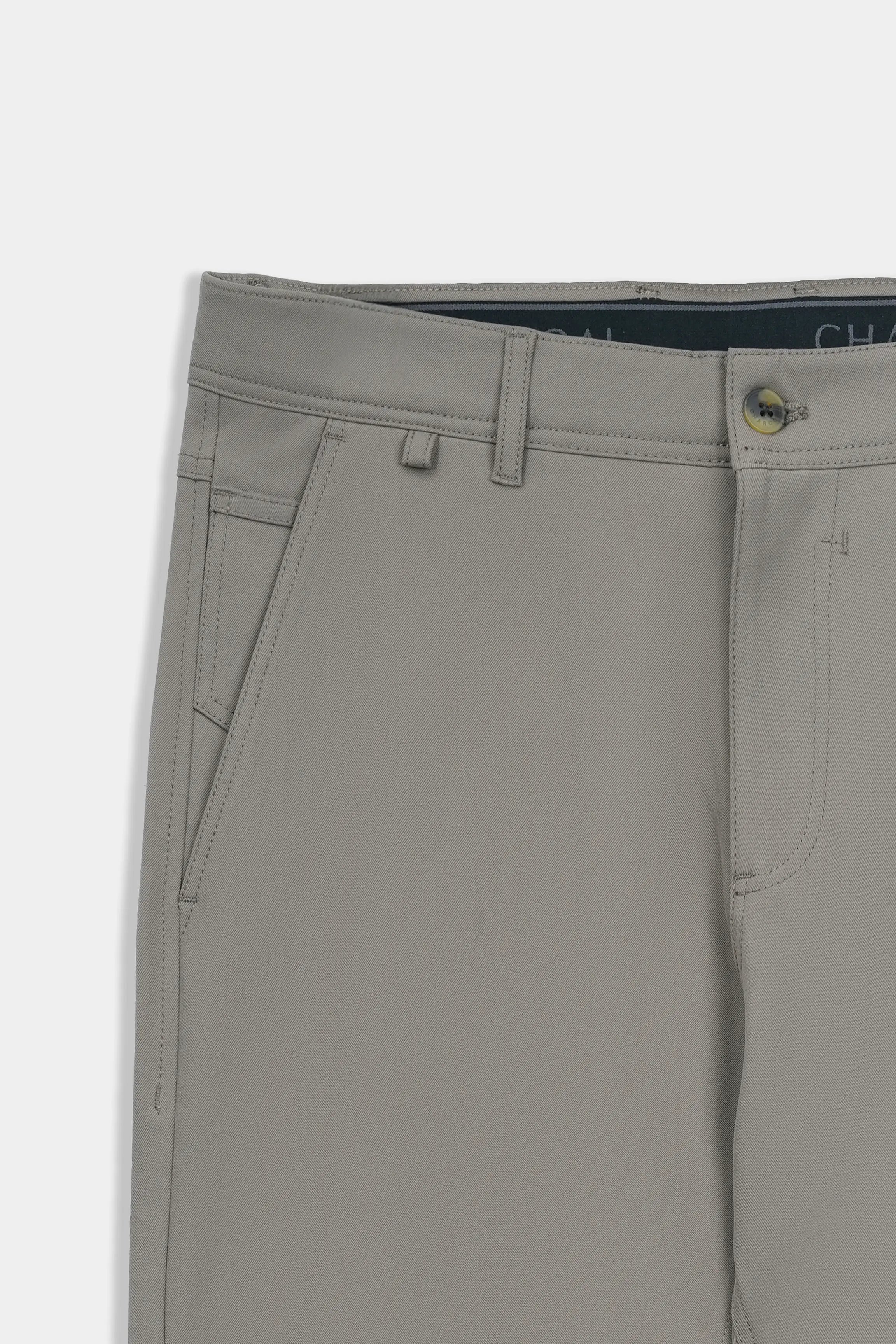 Straight-fit travel pants in light brown, waistband with belt loops and interior label.