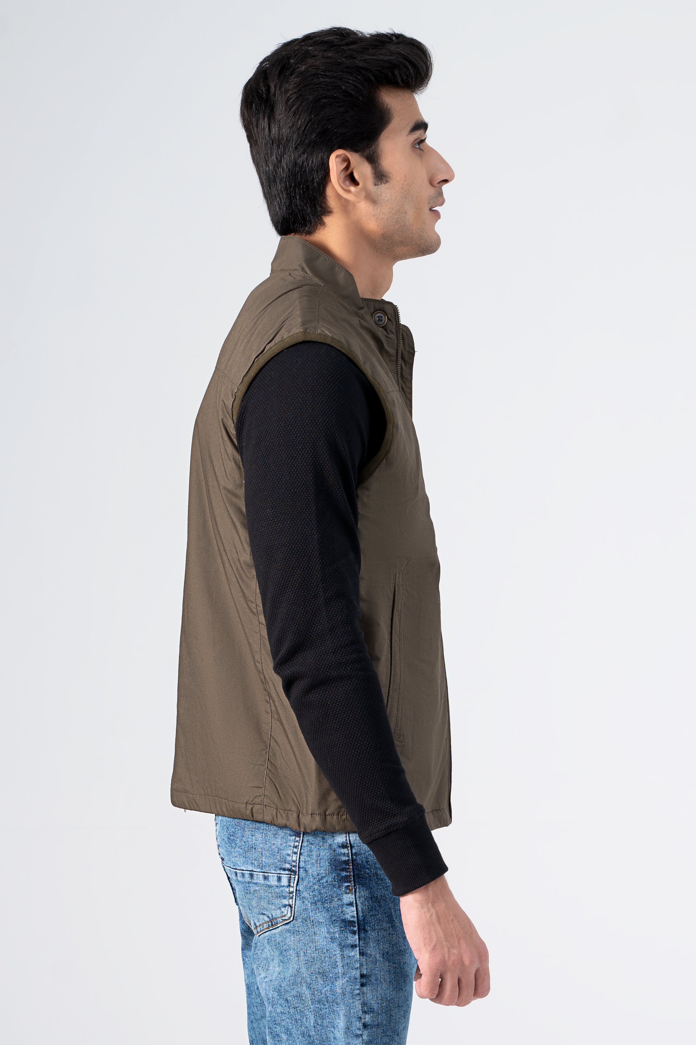 Padded cotton jacket in olive-brown, sleeveless design with stand collar