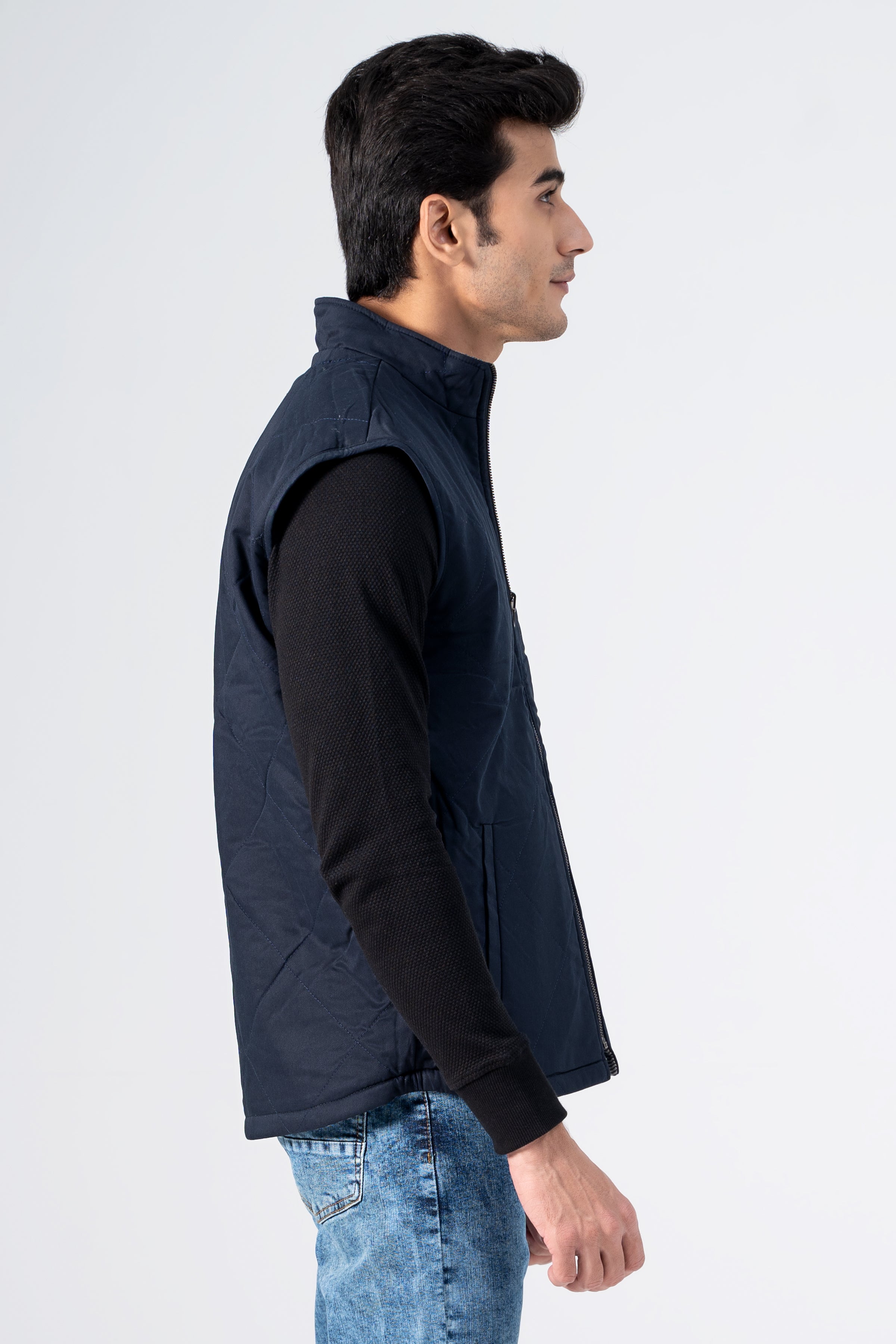 Reversible quilted jacket, dark navy quilted body with zipper over black sleeves