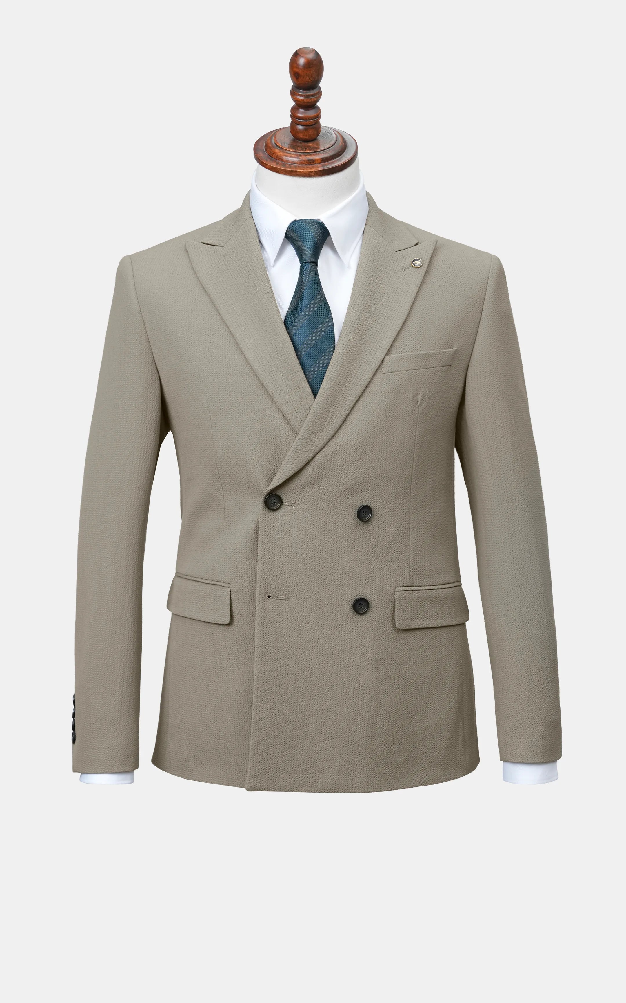 Olive double-breasted suit jacket with notched lapels and four-button front