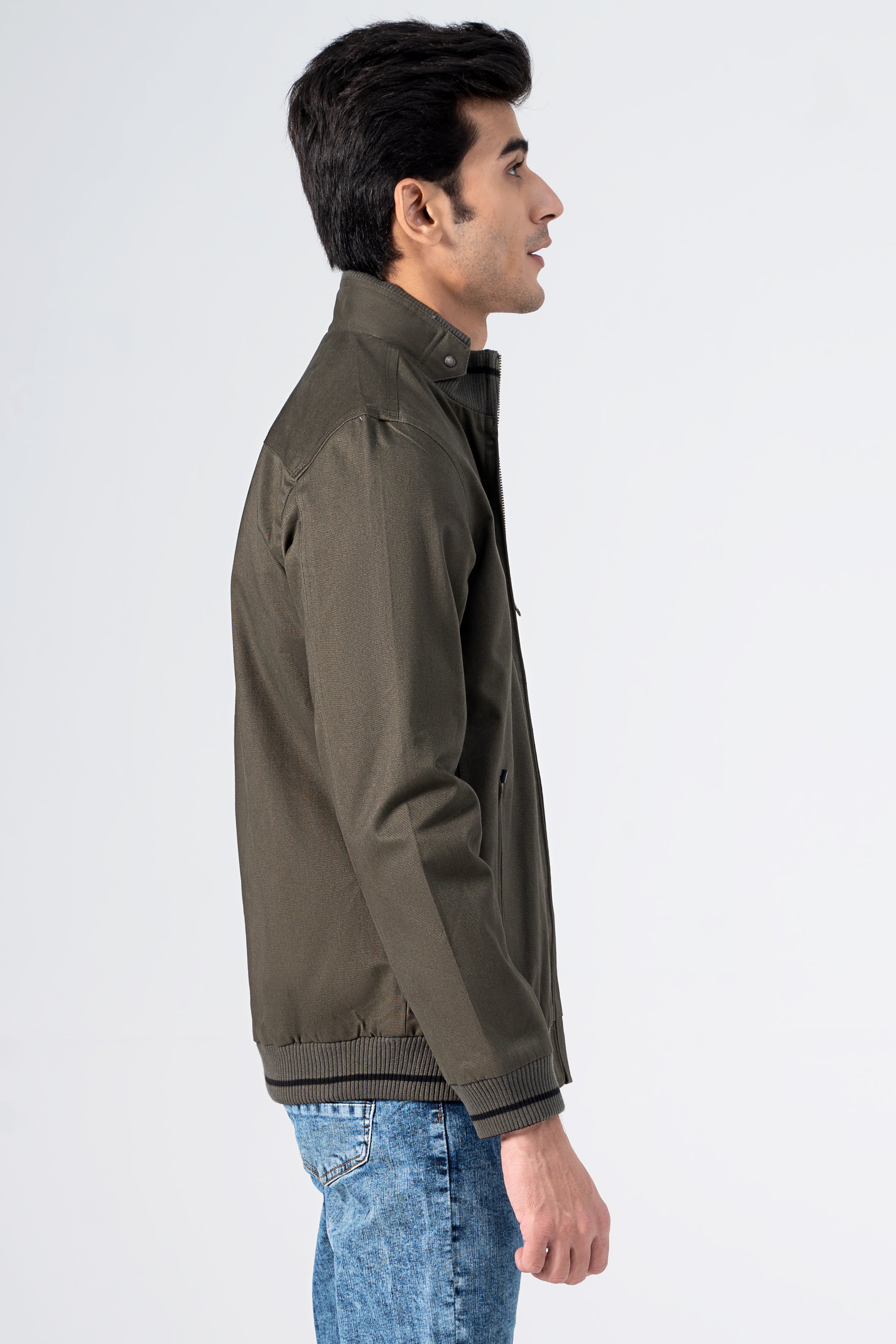 Reversible jacket in olive with stand collar, zip front, ribbed cuffs, side zip pocket