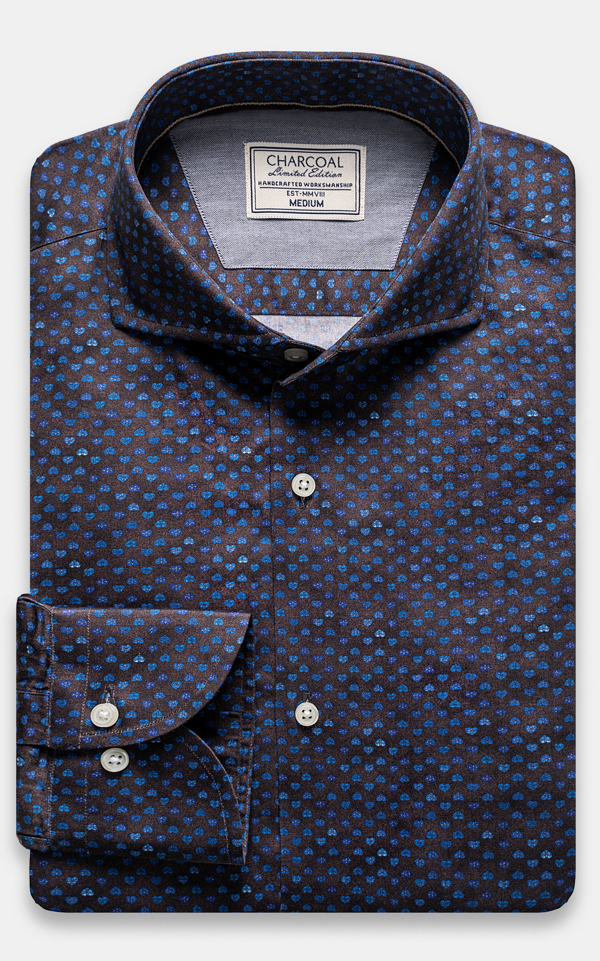 Dark brown button-up shirt with blue dot pattern, collar and chest buttons