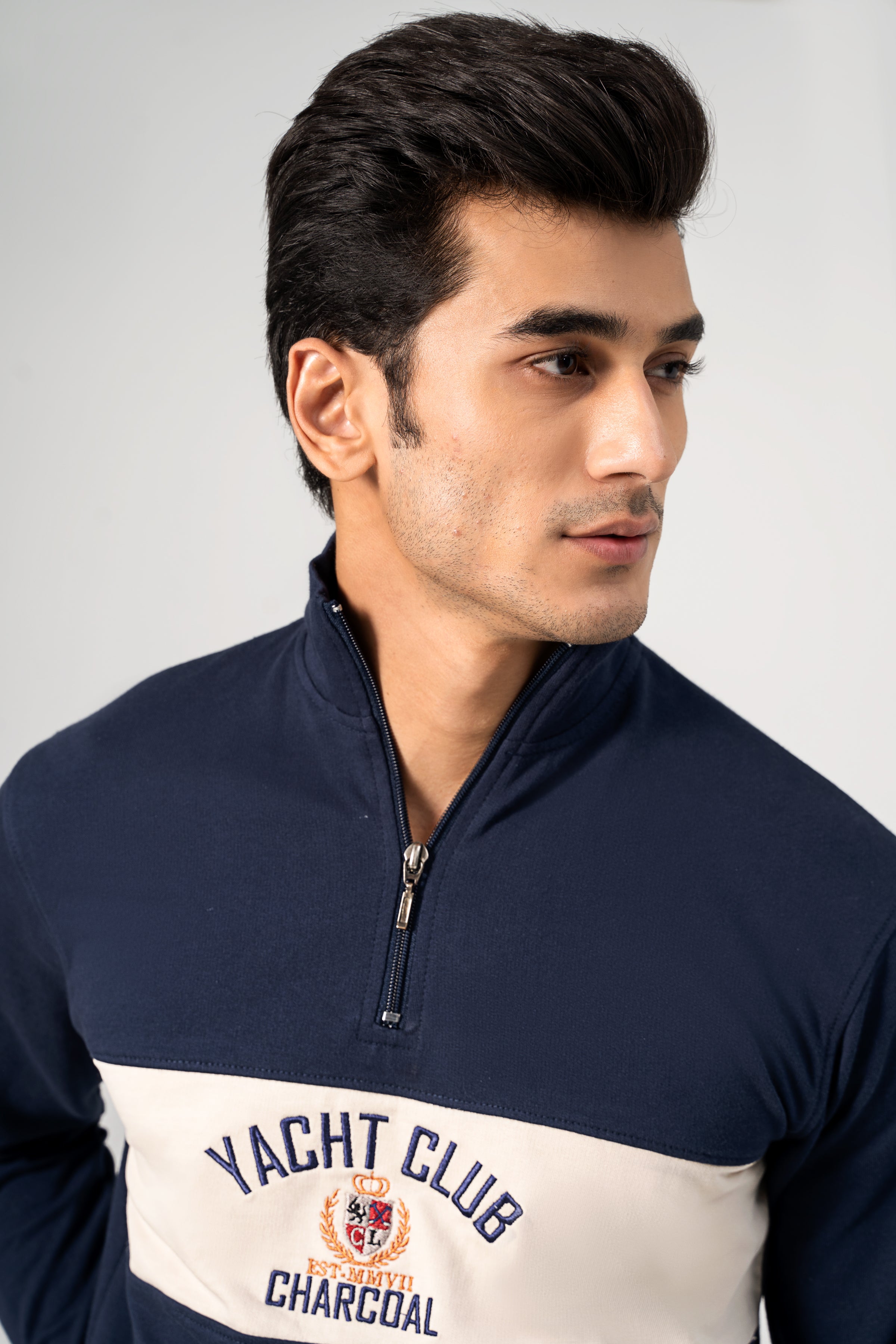 Navy mock neck half-zip sweatshirt close-up with Yacht Club logo on white band