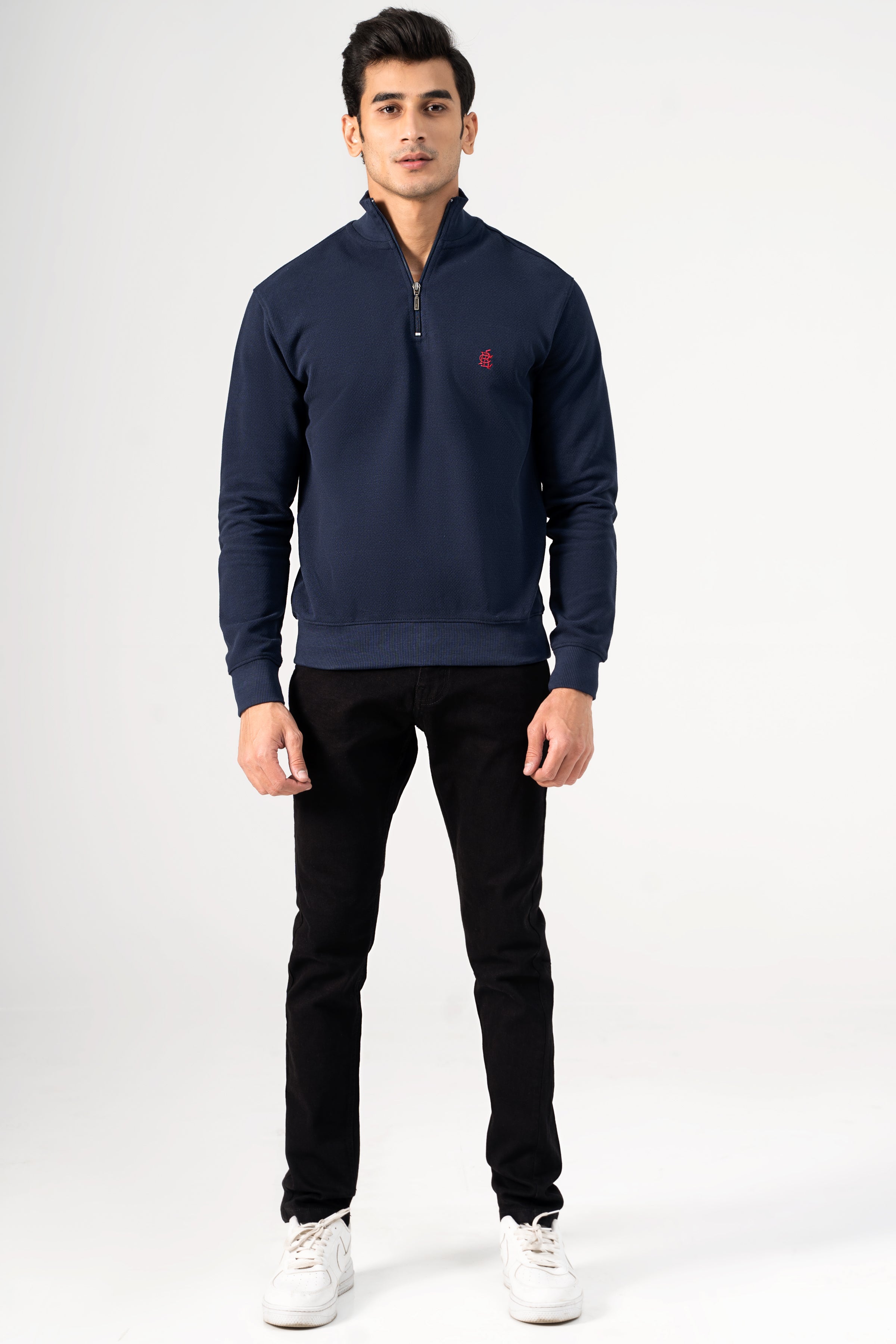 Navy mock-neck quarter-zip sweatshirt with red chest logo and long sleeves