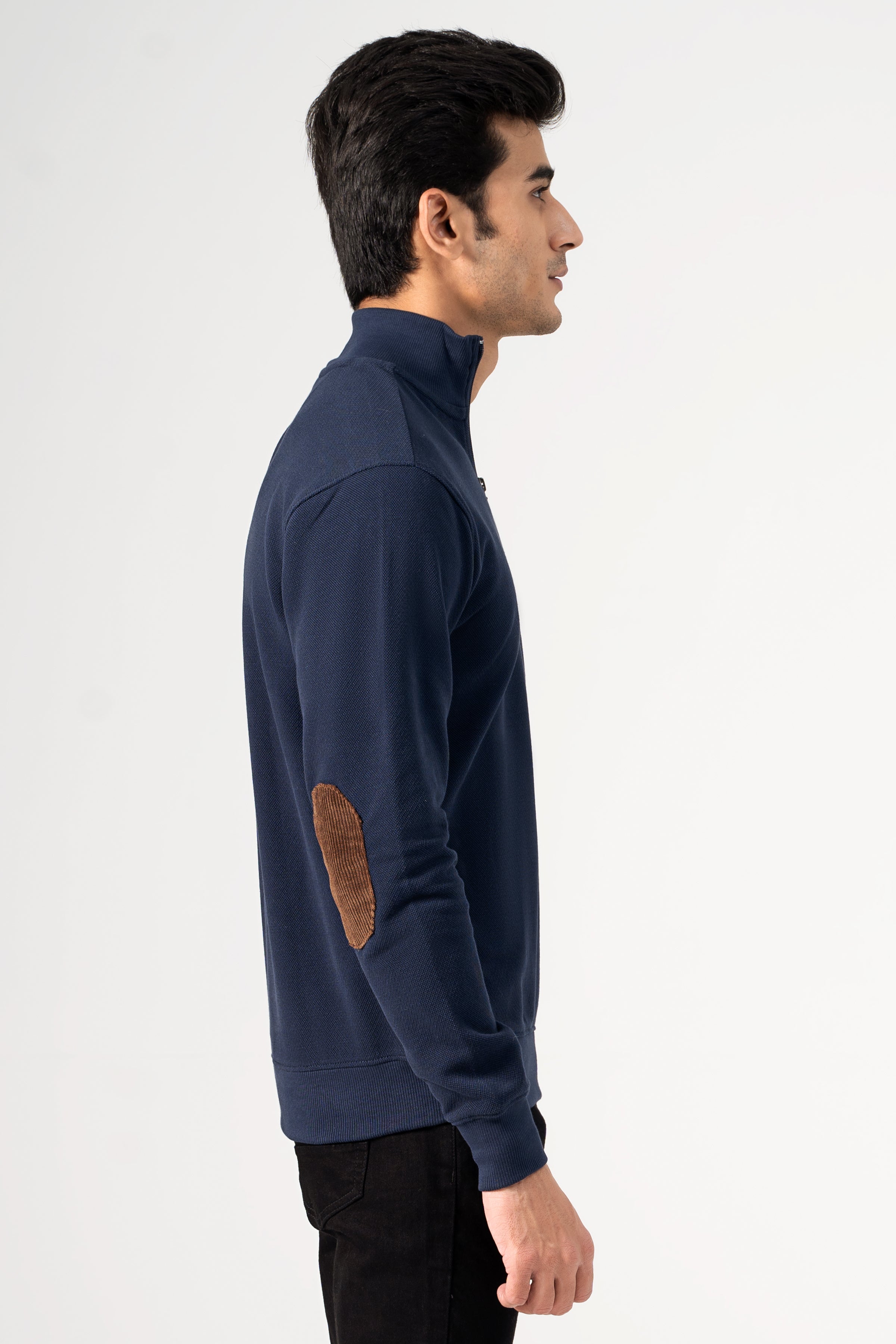 Navy mock-neck sweatshirt with tan elbow patch and side quarter-zip seam