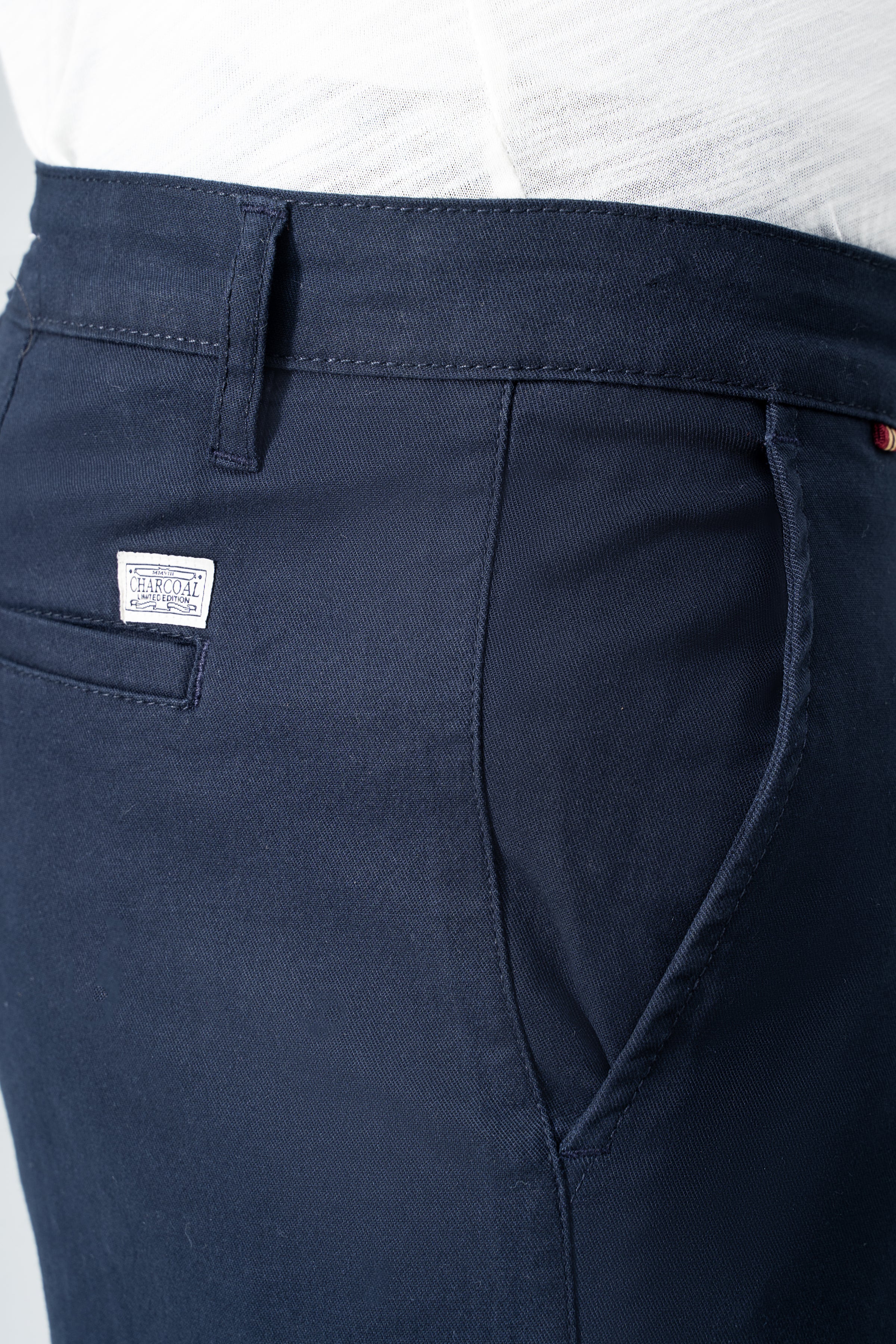 Navy twill pants front pocket and fly area with button detail