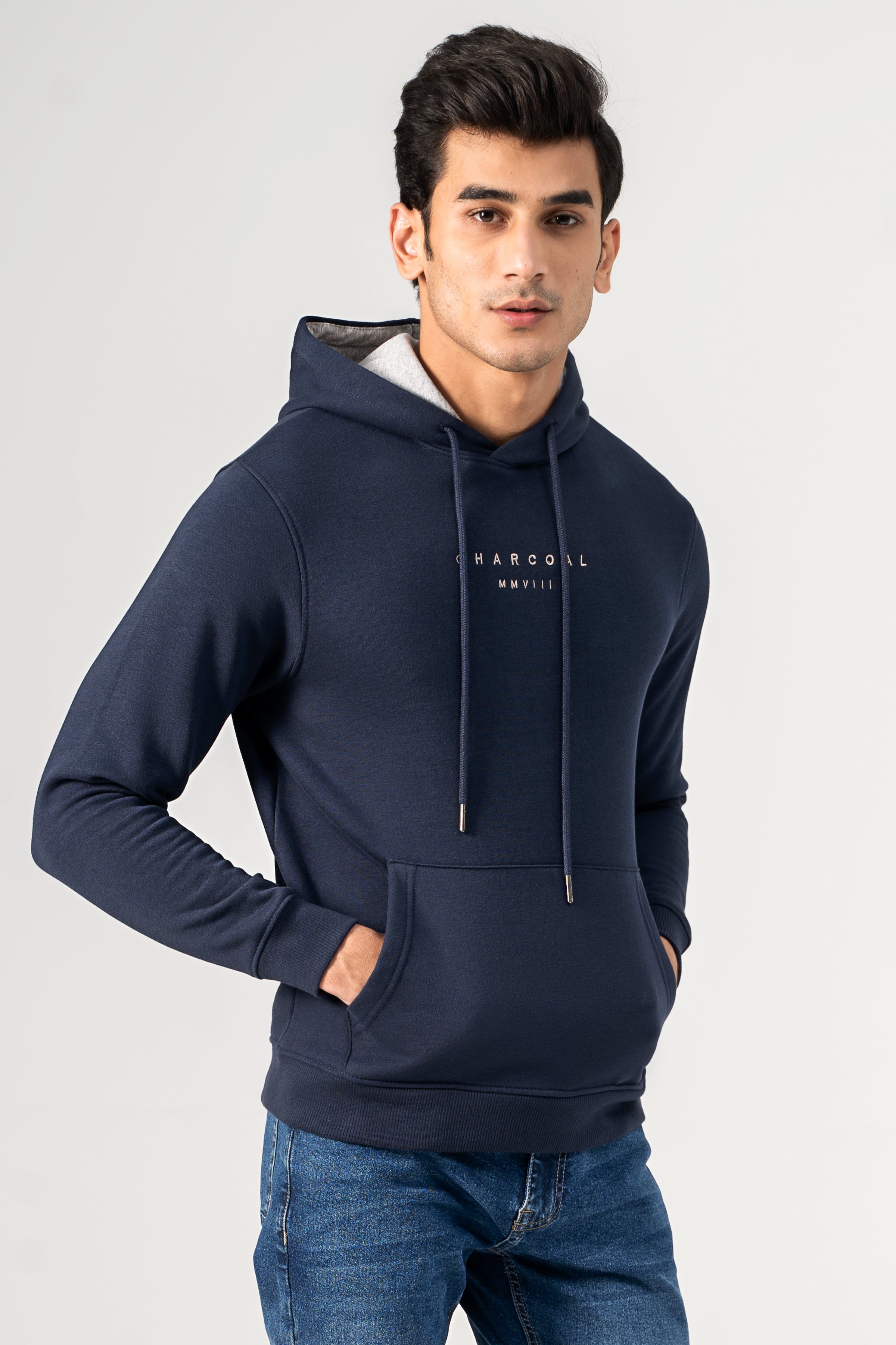Navy hoodie with drawstring hood and front pocket, small chest logo detail