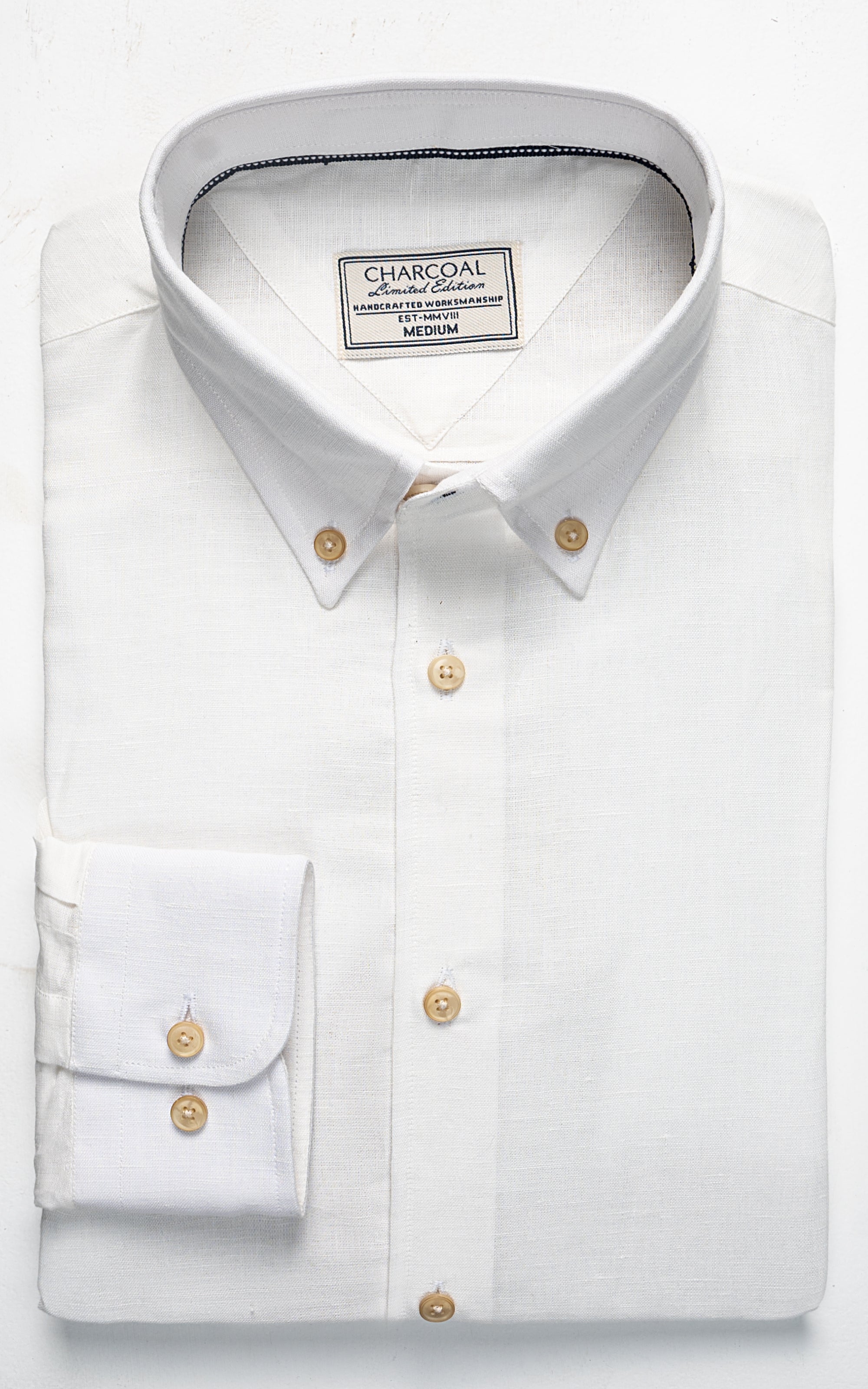 Off-white linen shirt with button-down collar and gold-tone buttons