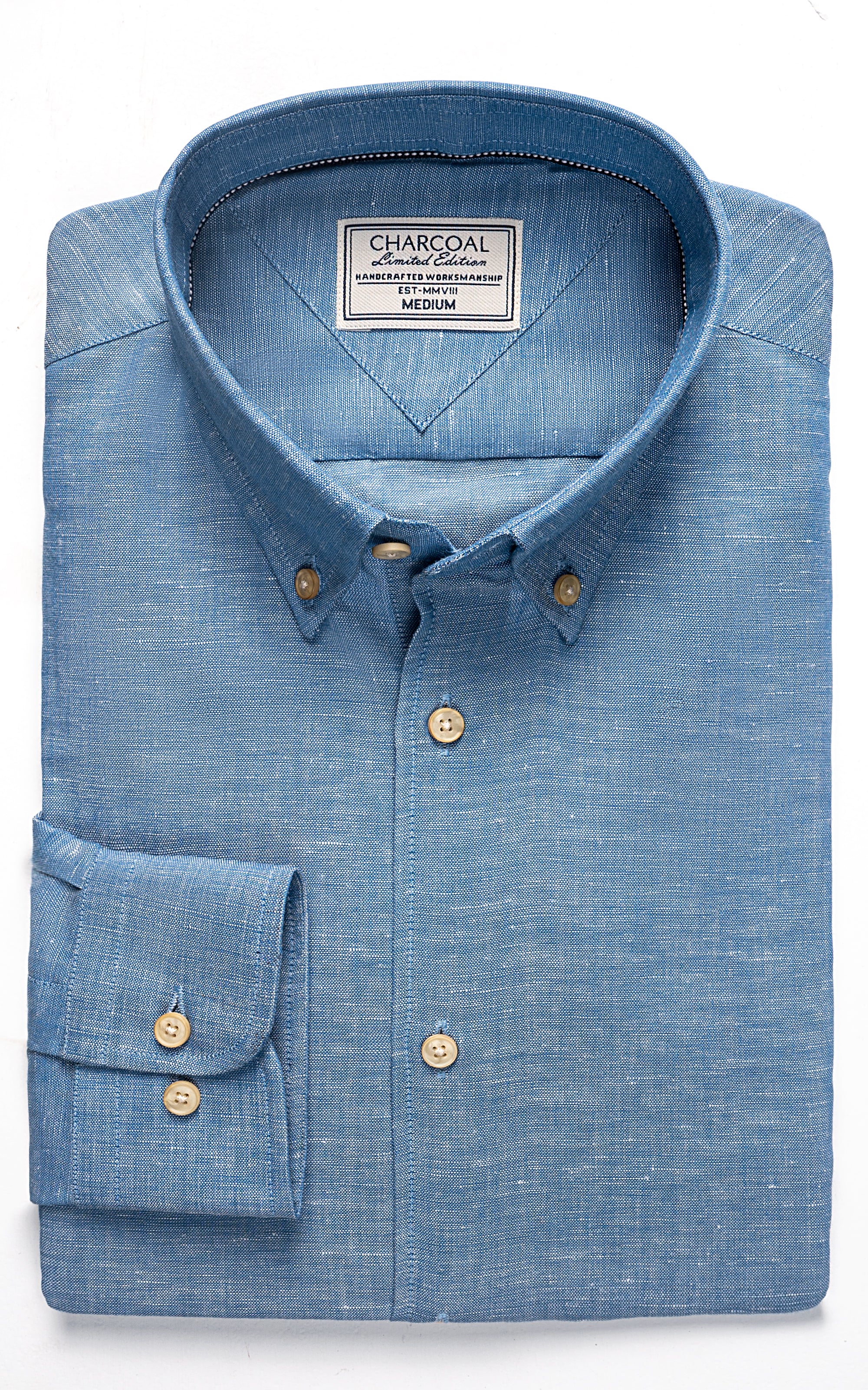 Linen chambray blue button-up shirt with collar, chest pocket, and tan buttons