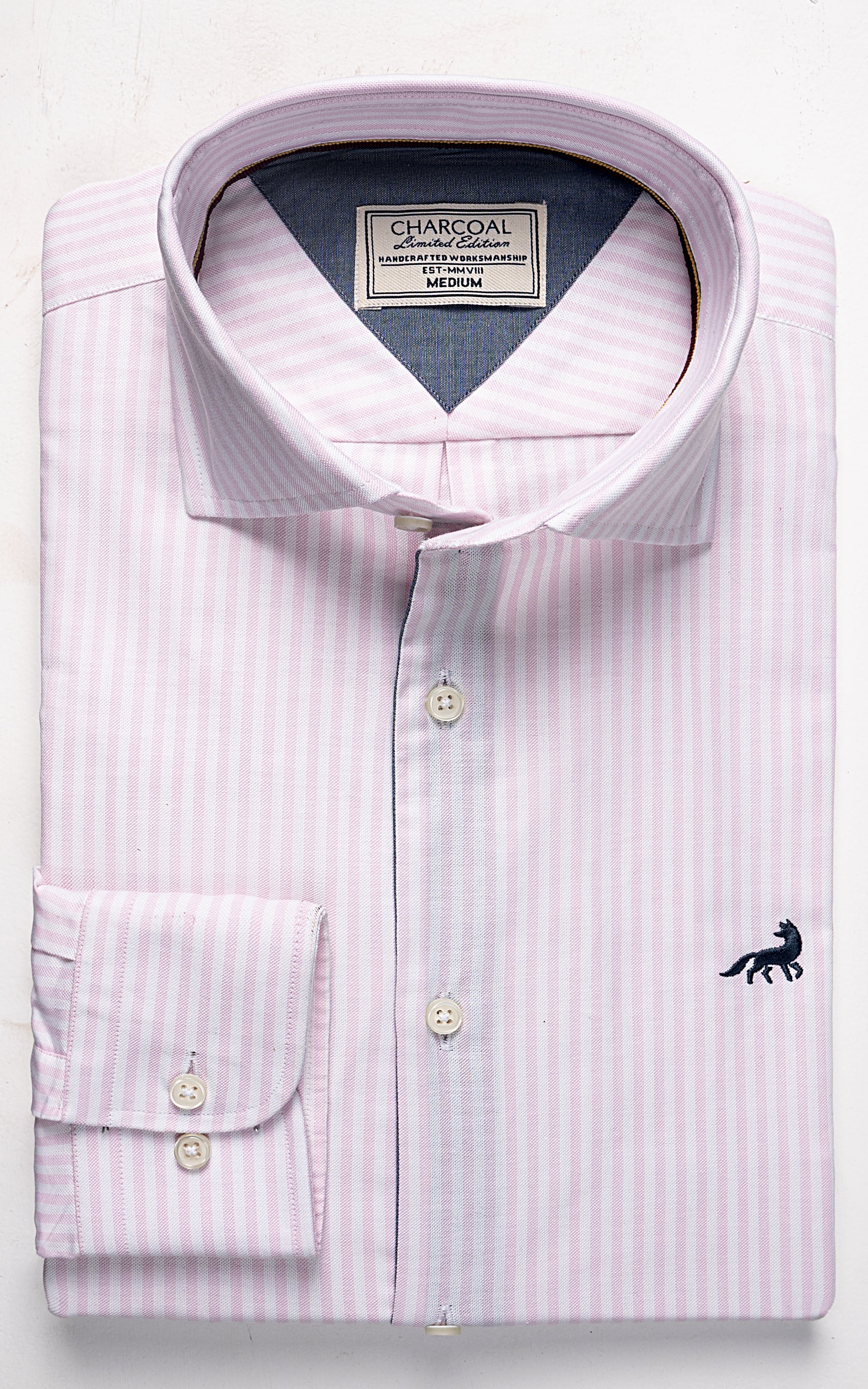 Pink striped dress shirt with button front and logo at chest pocket