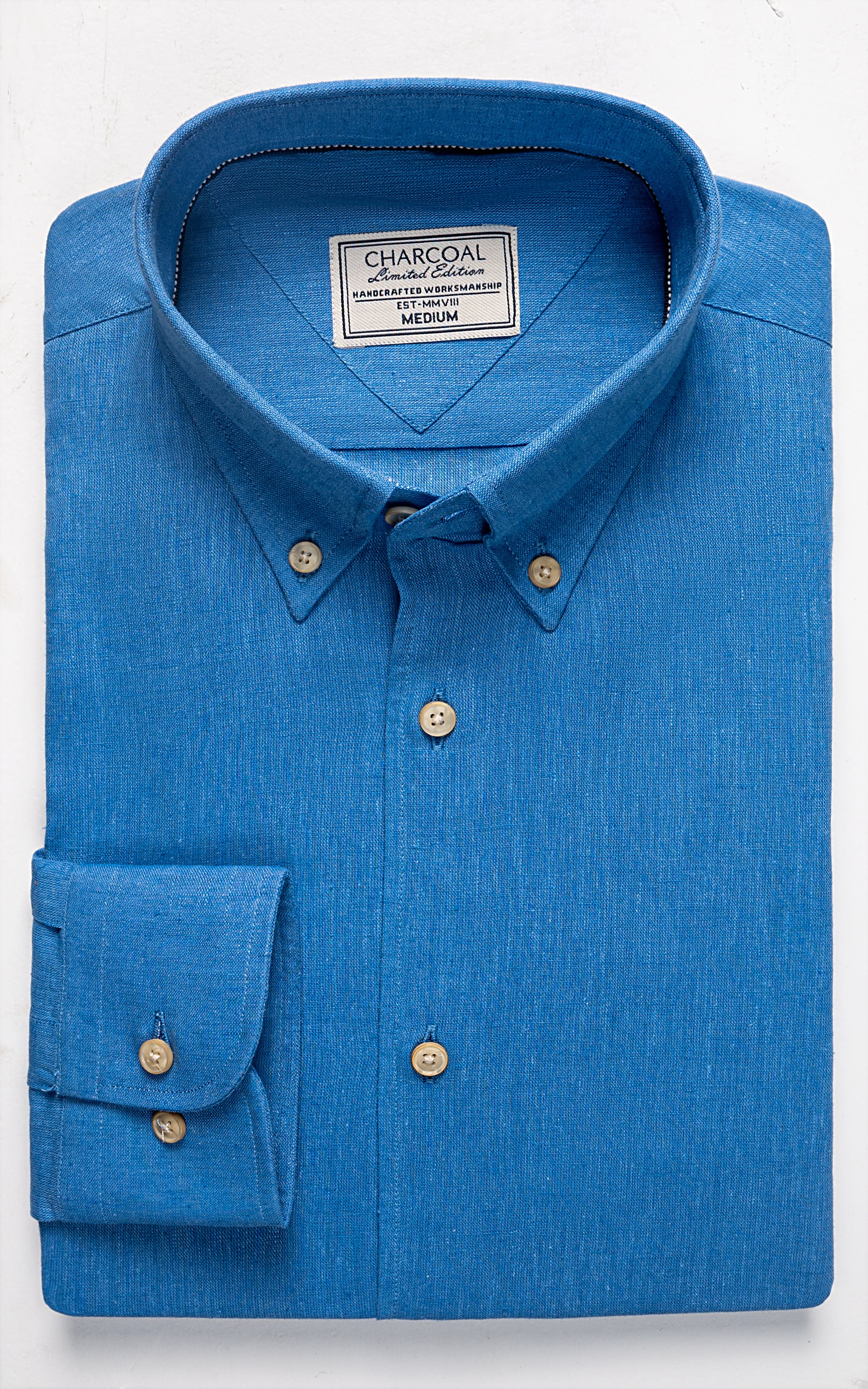 Blue linen limited edition shirt with button front, spread collar, chest pocket