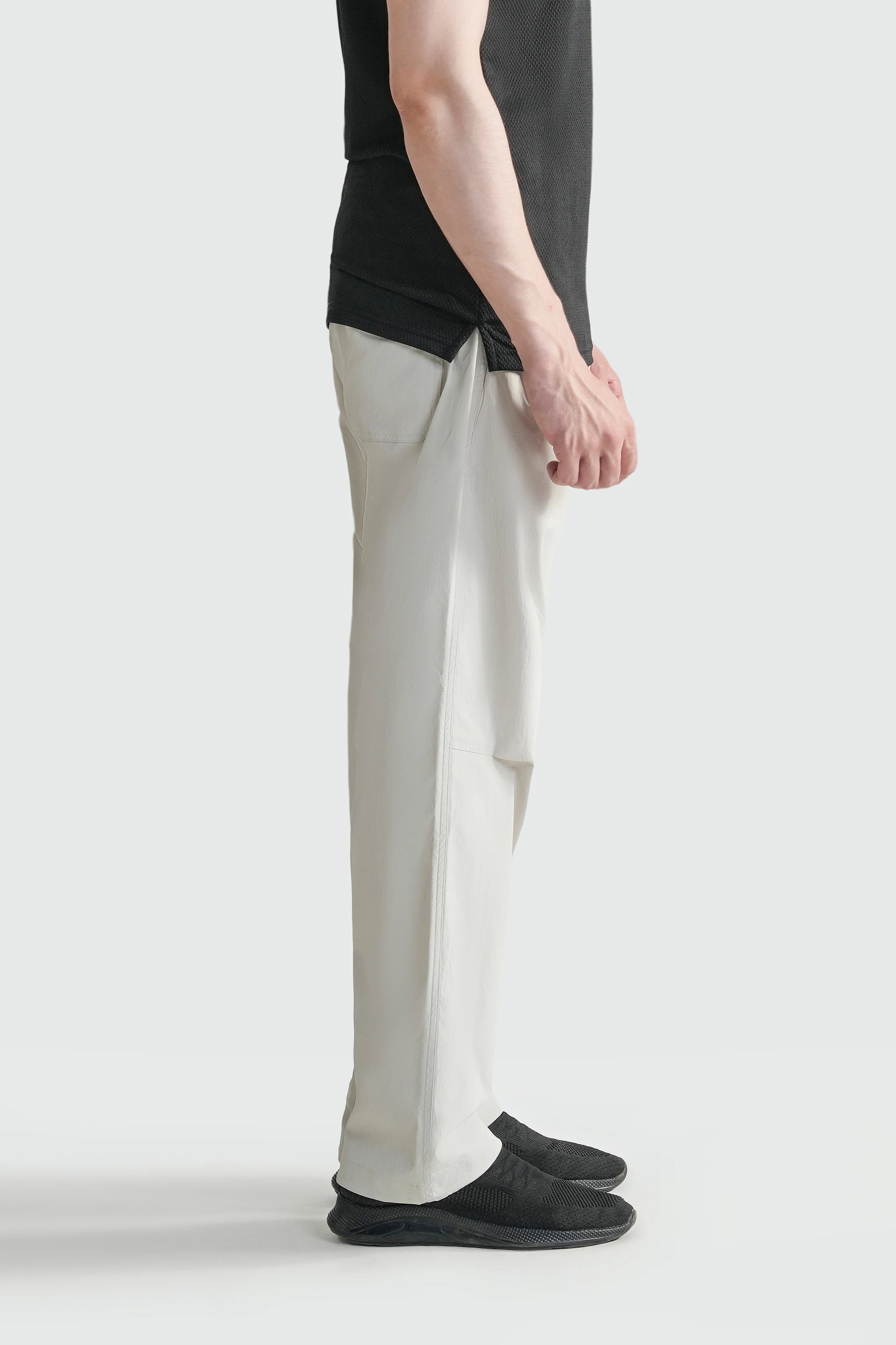 Stone loose-fit casual pants with elastic waist, side seam, and straight tapered leg