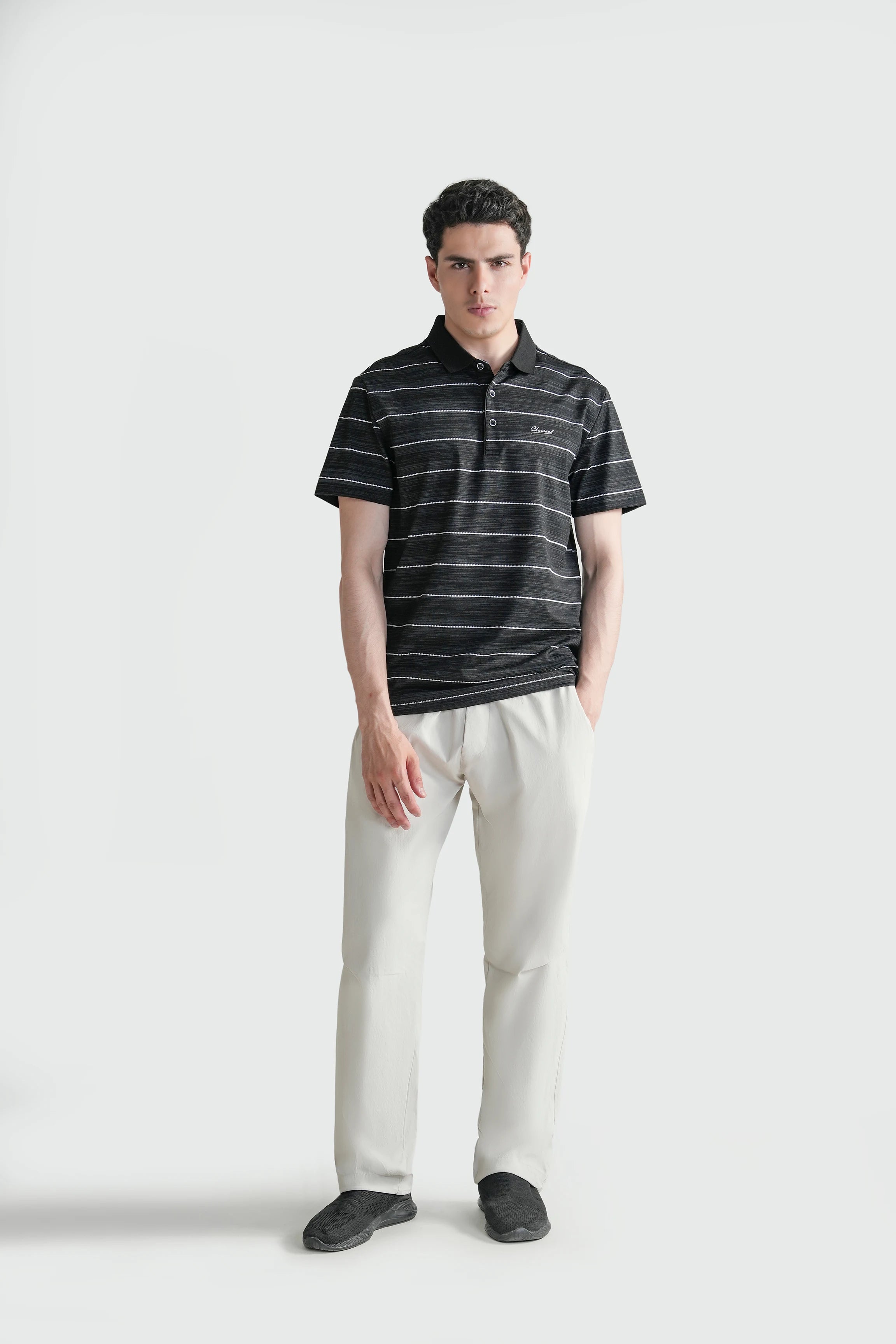 Men's black striped premium polo shirt with short sleeves and button placket