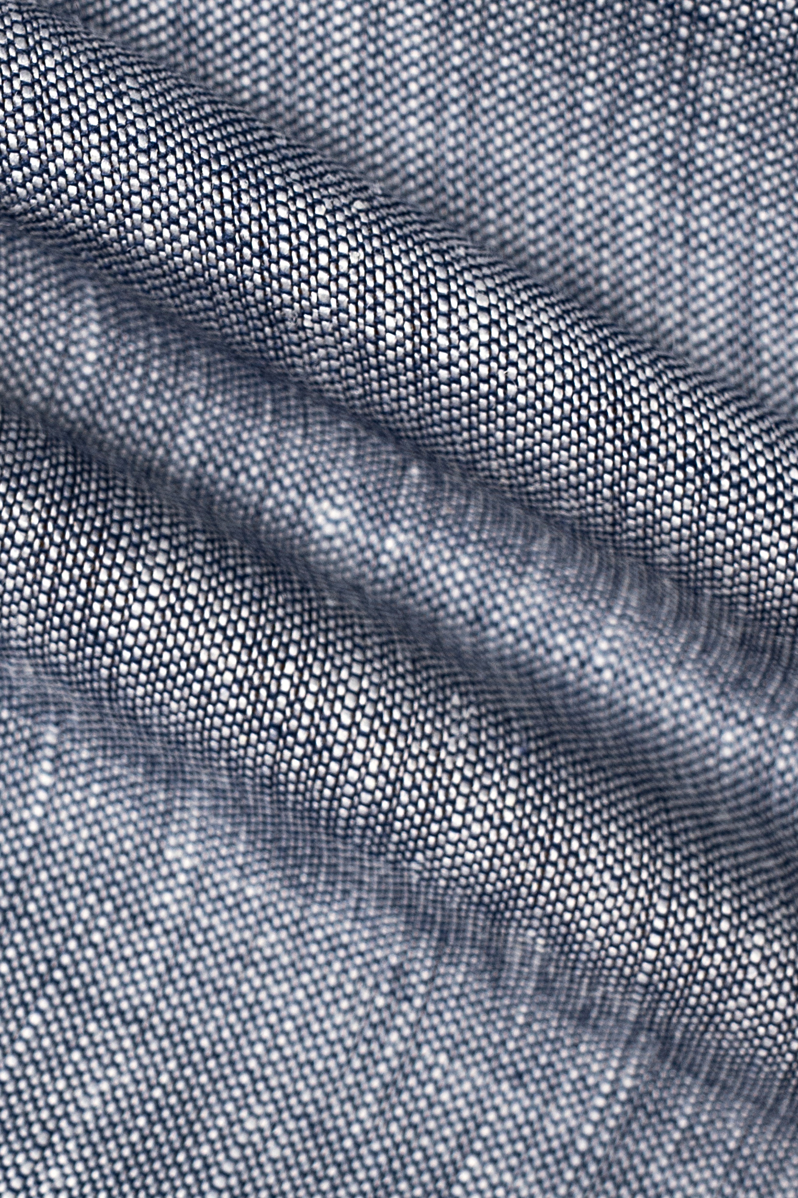 Bluish grey linen fabric close-up with fine woven texture