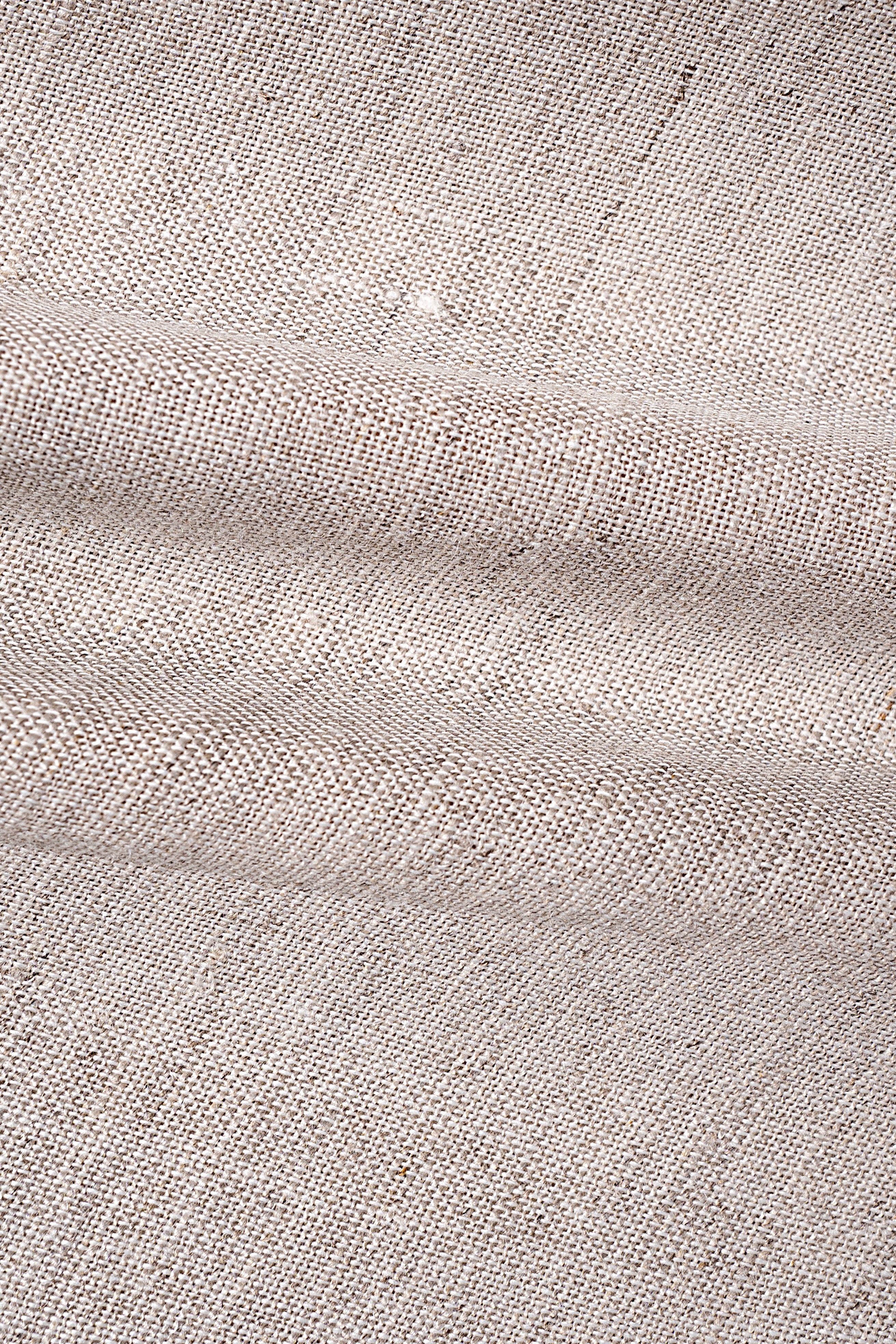 Light khaki linen fabric weave close-up