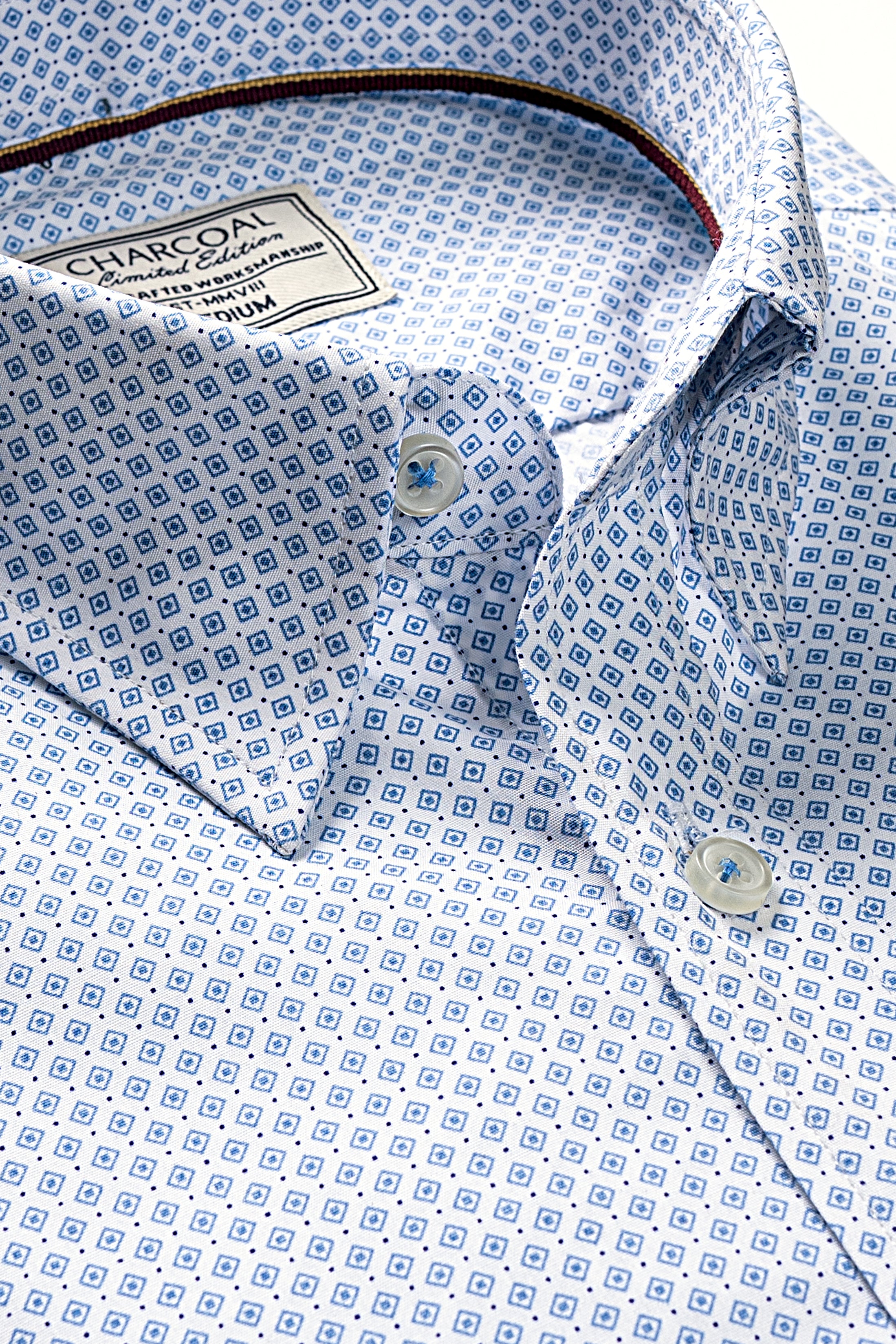 Printed dress shirt collar and chest label, light blue geometric pattern