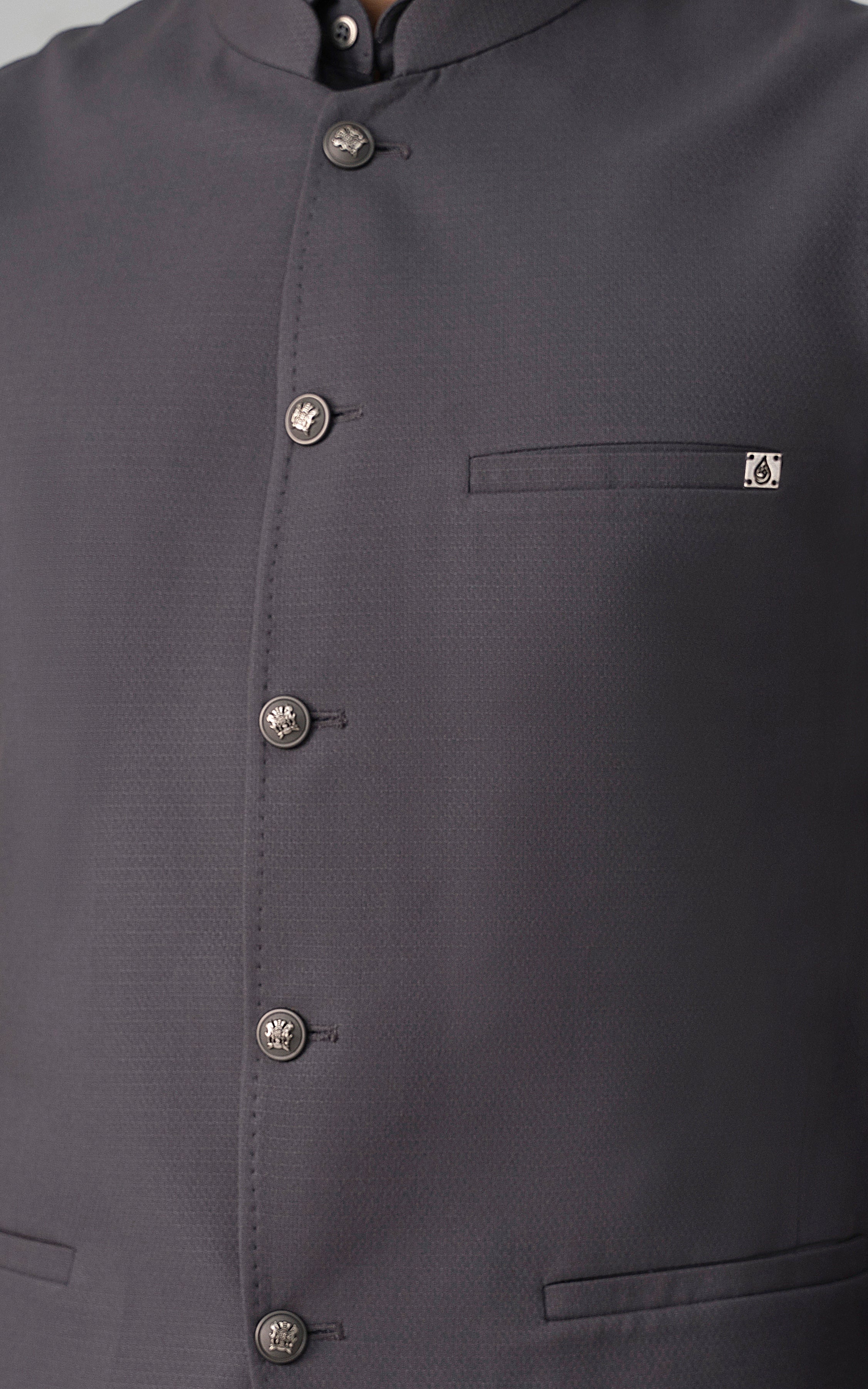 Close-up of mid-grey waistcoat front with button placket and chest pocket