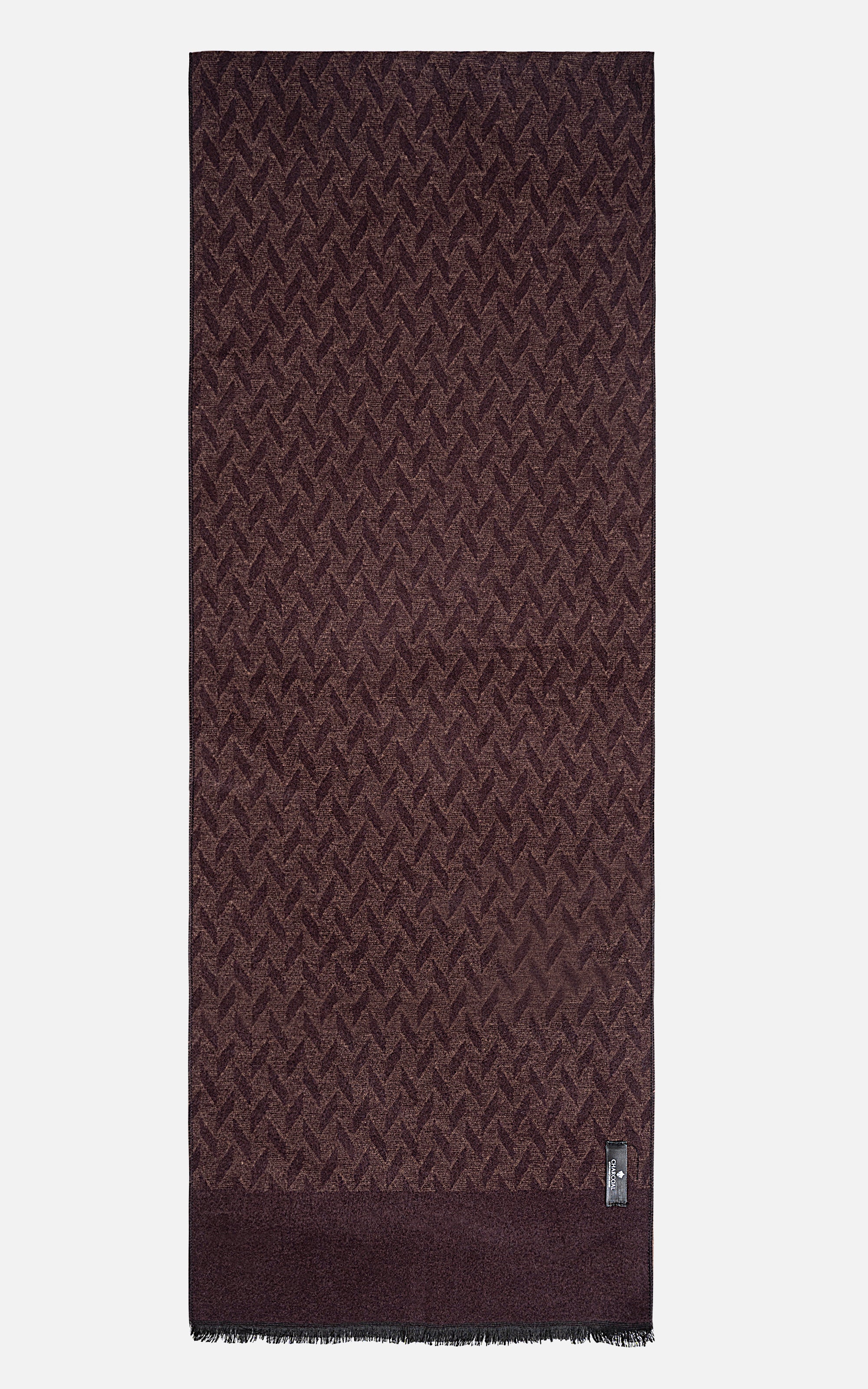 Burgundy woven scarf with subtle pattern and fringe end