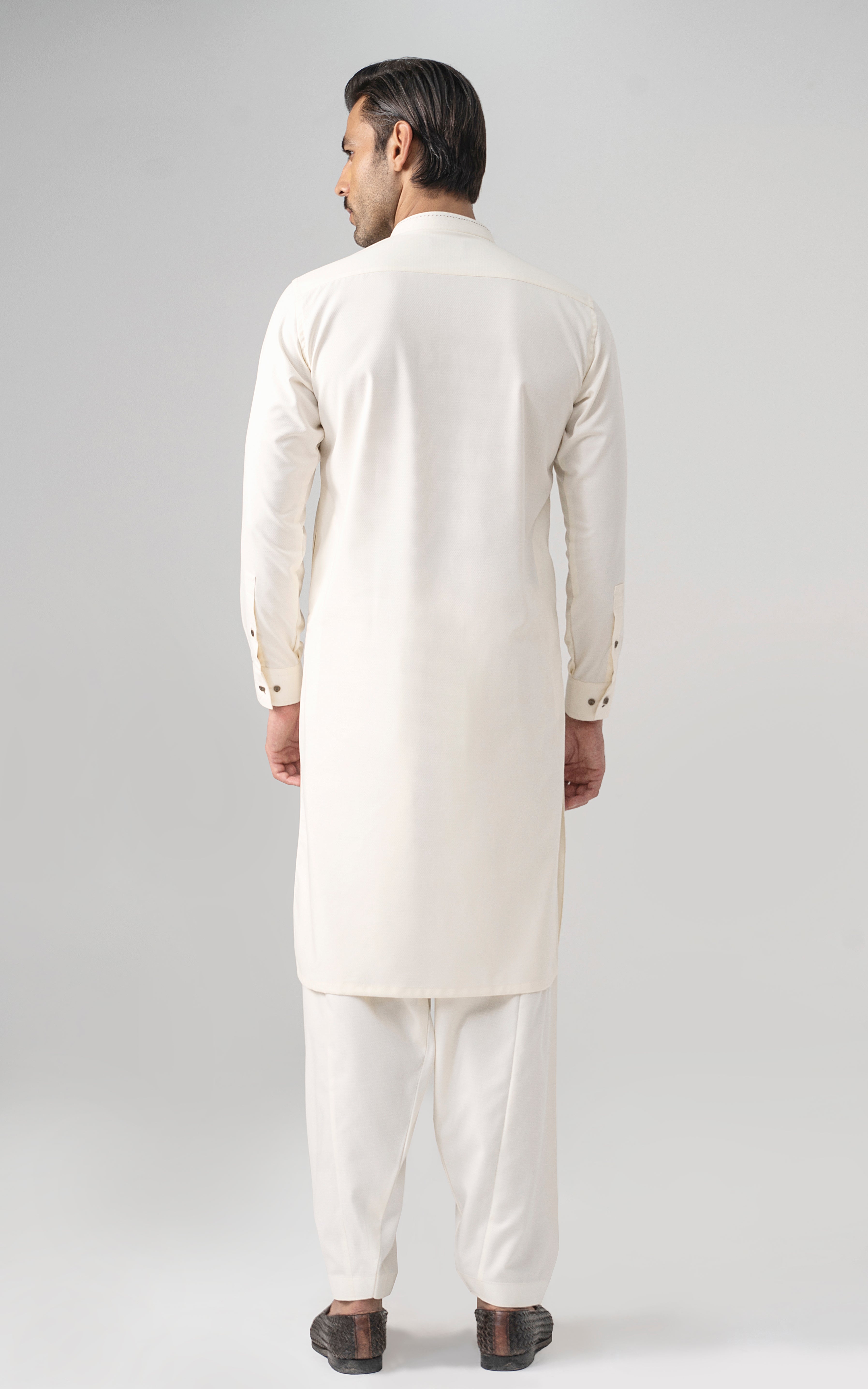 Off-white long kurta and matching pants, back view