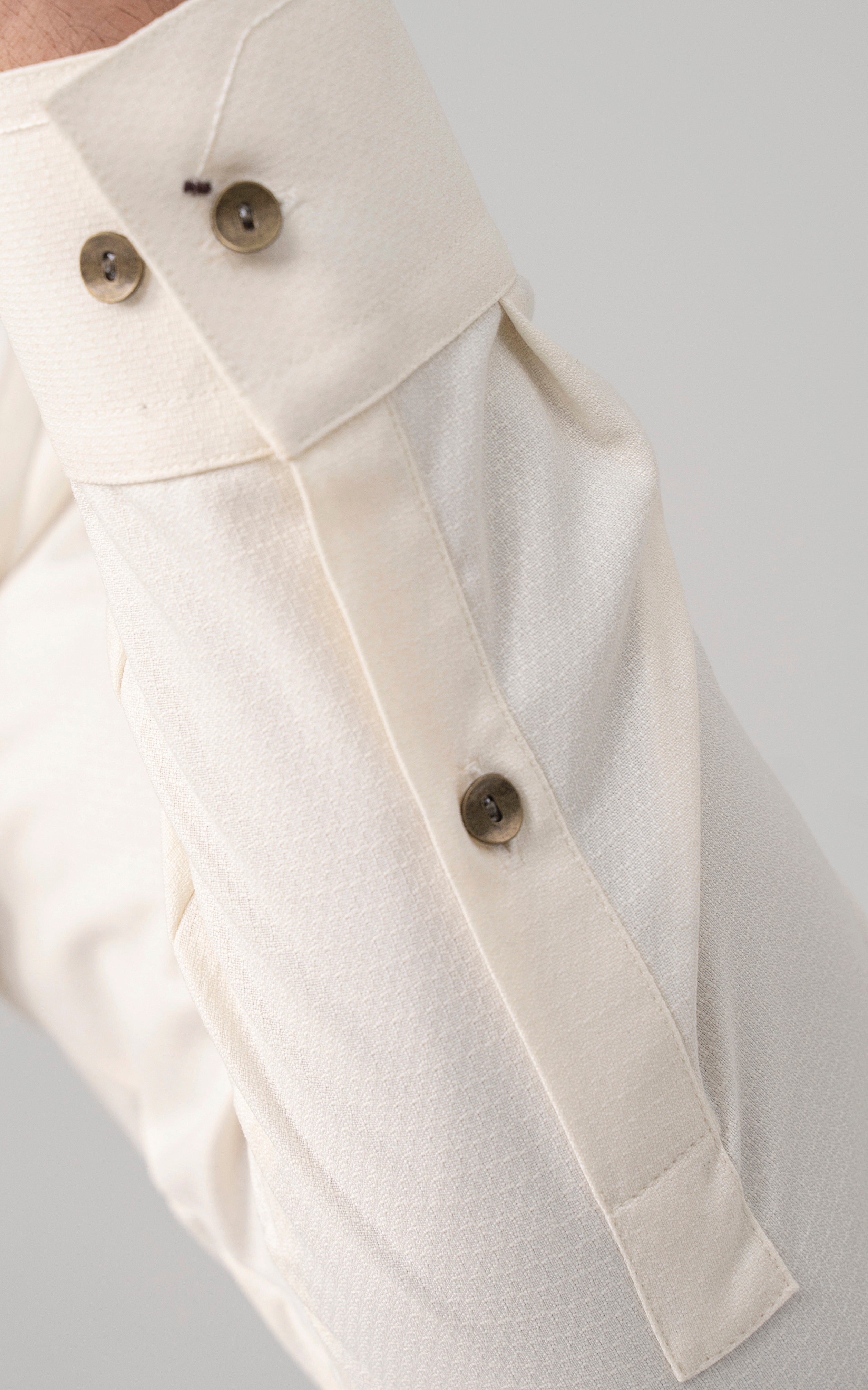 Off-white kurta textured front with diagonal button placket detail