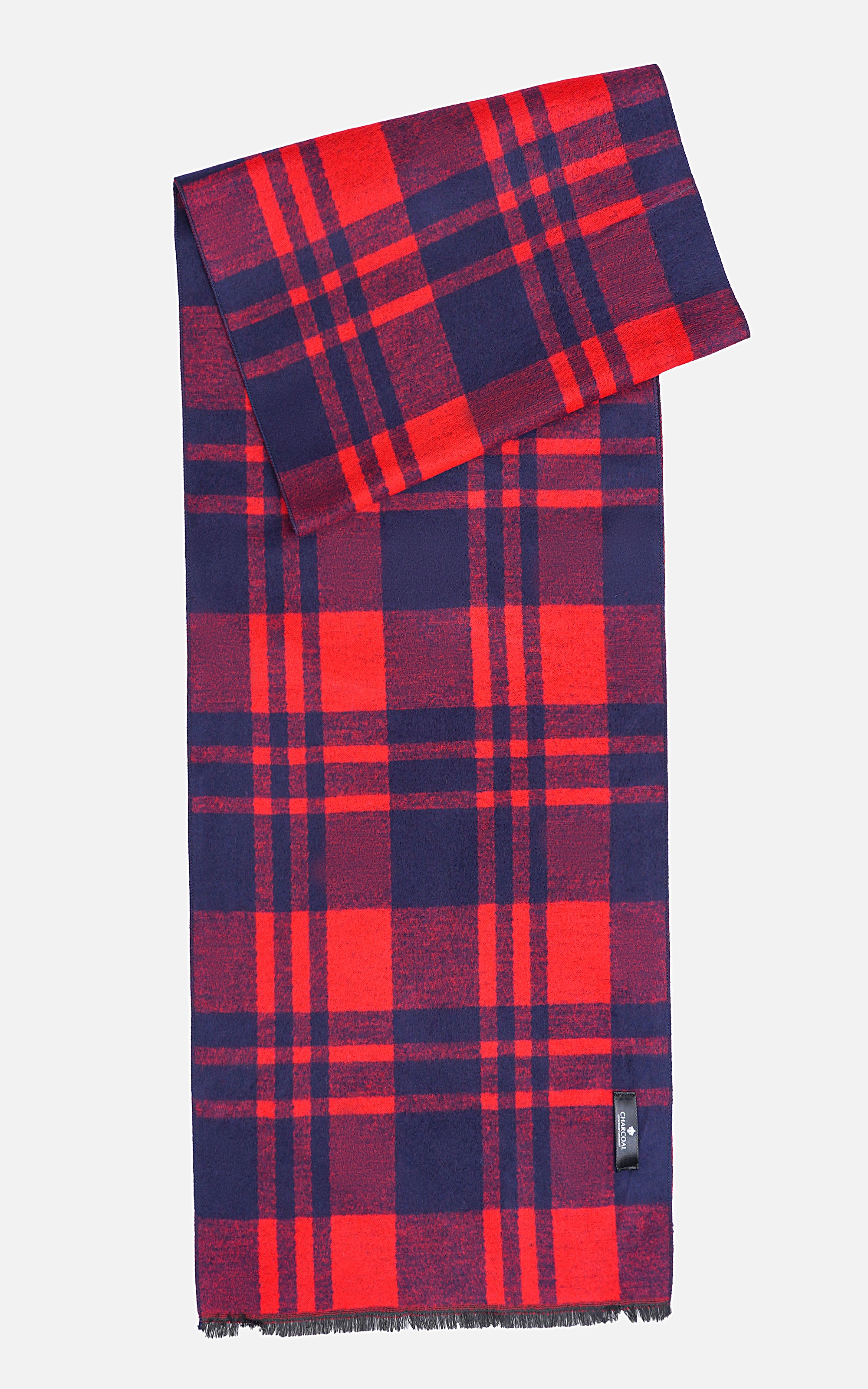 Plaid scarf in red and navy blocks with short fringed edges.
