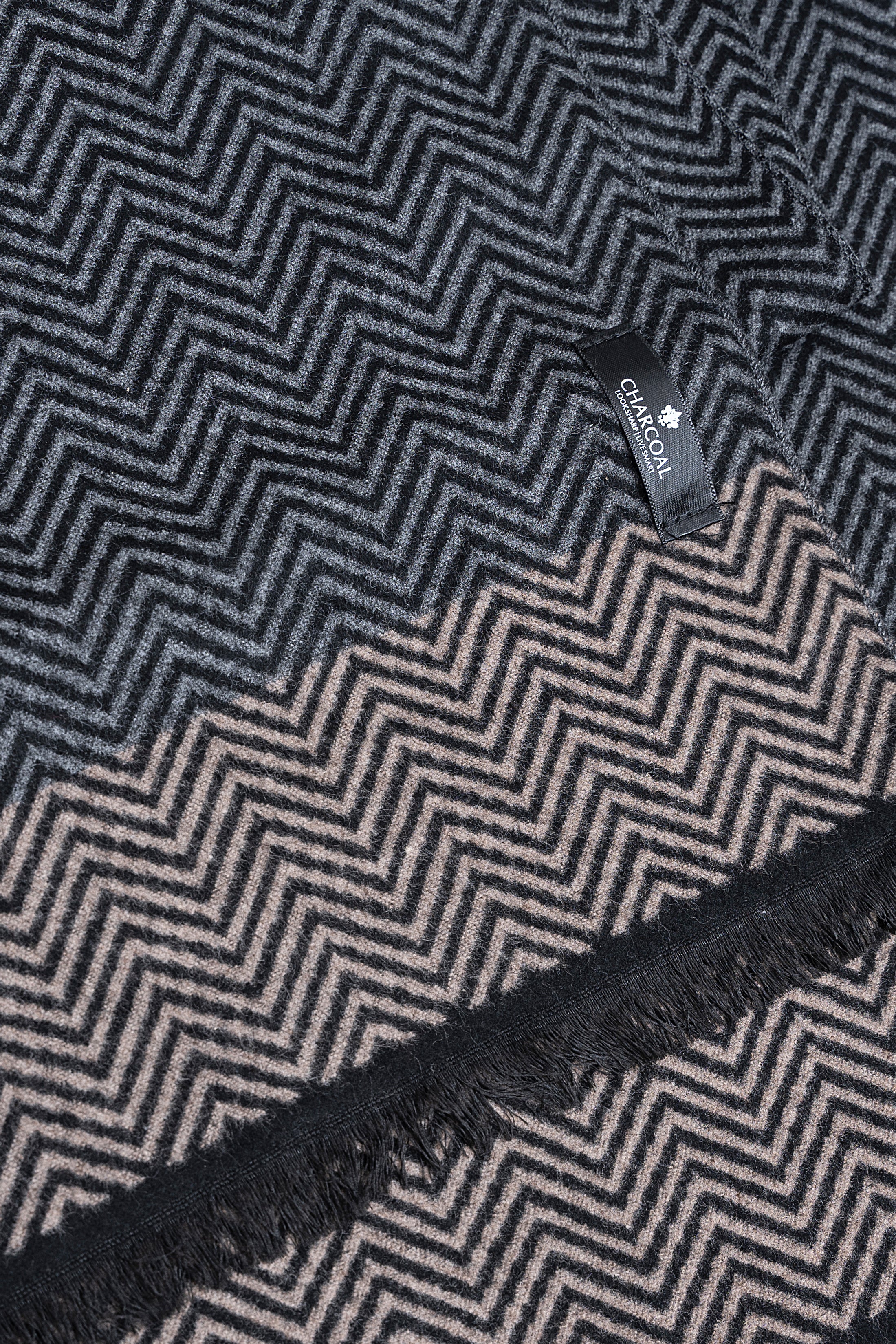 Dark navy chevron scarf close-up with label tag and fringe