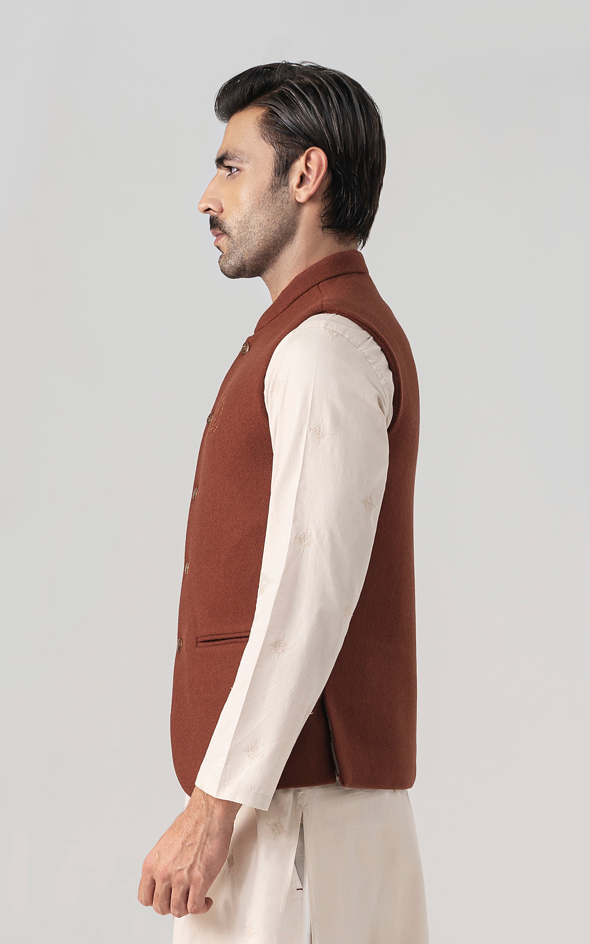 Rust wool-blend waistcoat side view with stand collar and front button placket
