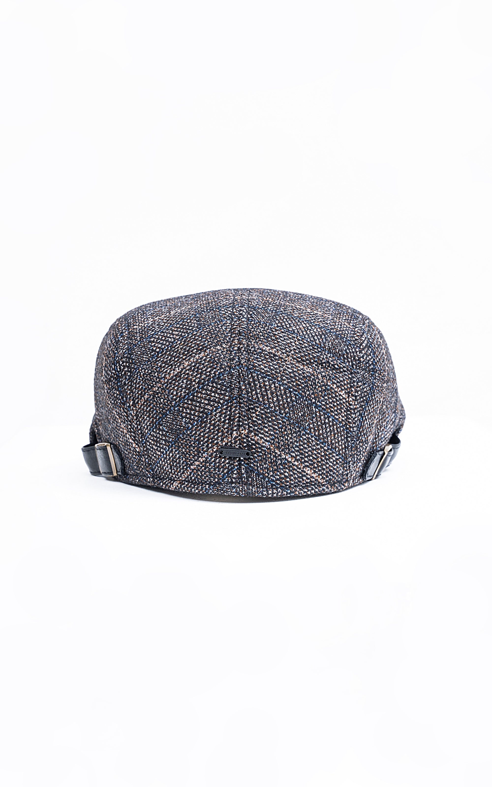 Golf cap front view in blue-gray tweed with small emblem and dark brim trim.