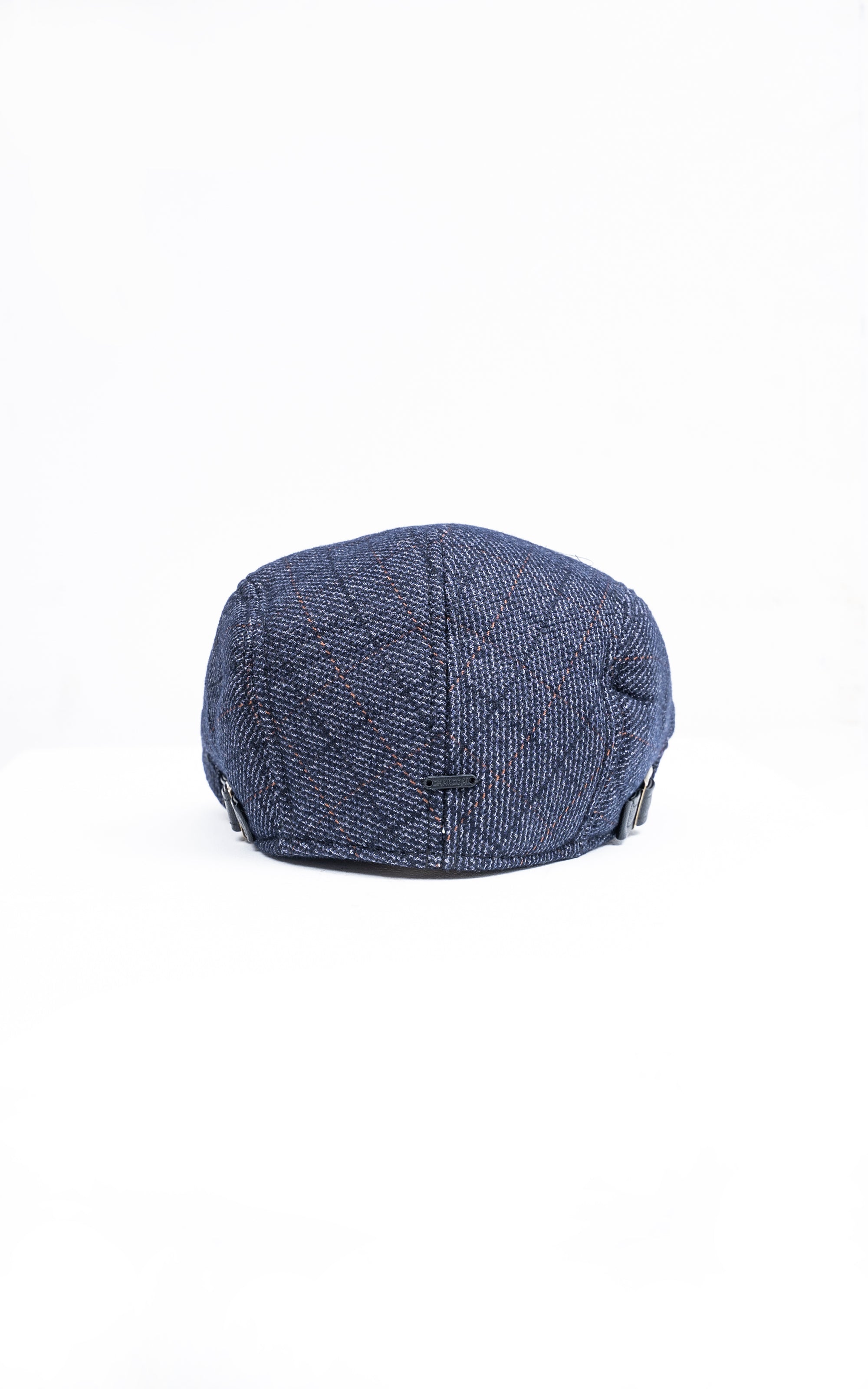 Navy blue golf cap with top button and vertical stitched seams