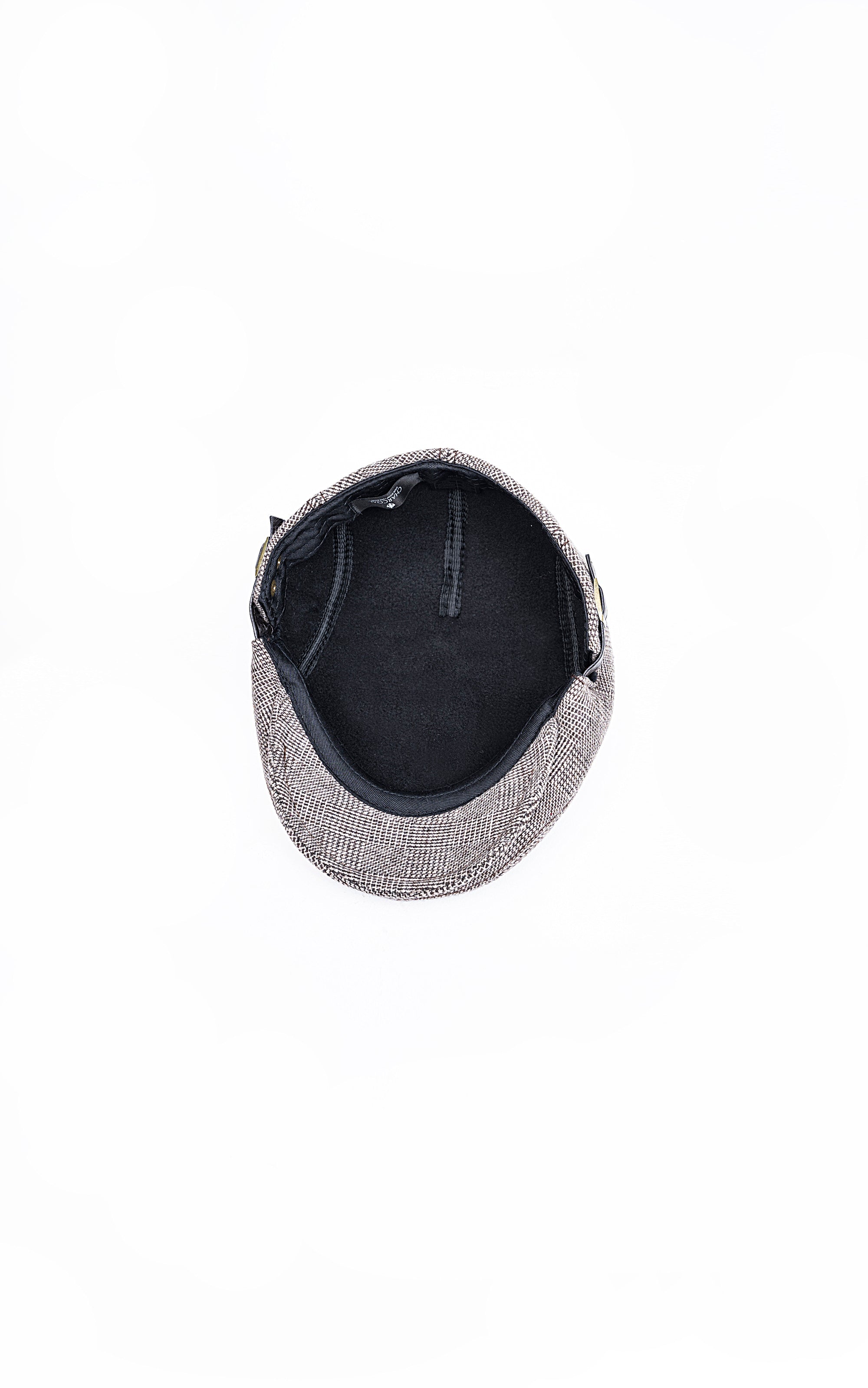 Golf cap interior view with dark lining and adjustable strap at back
