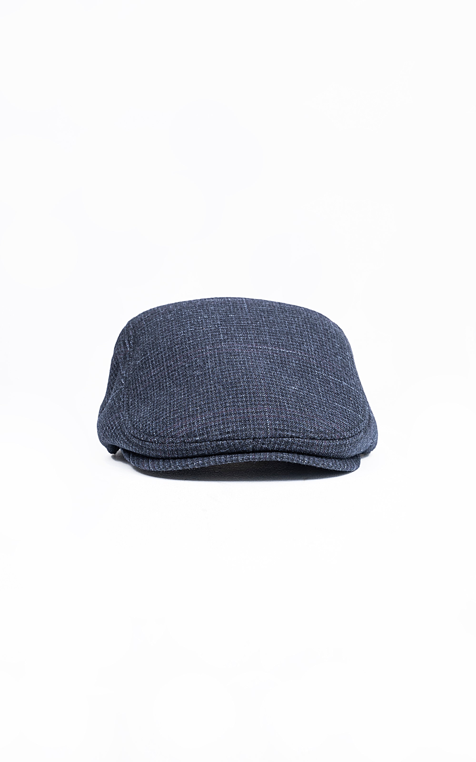 Dark blue golf cap with curved crown and stitched panel lines