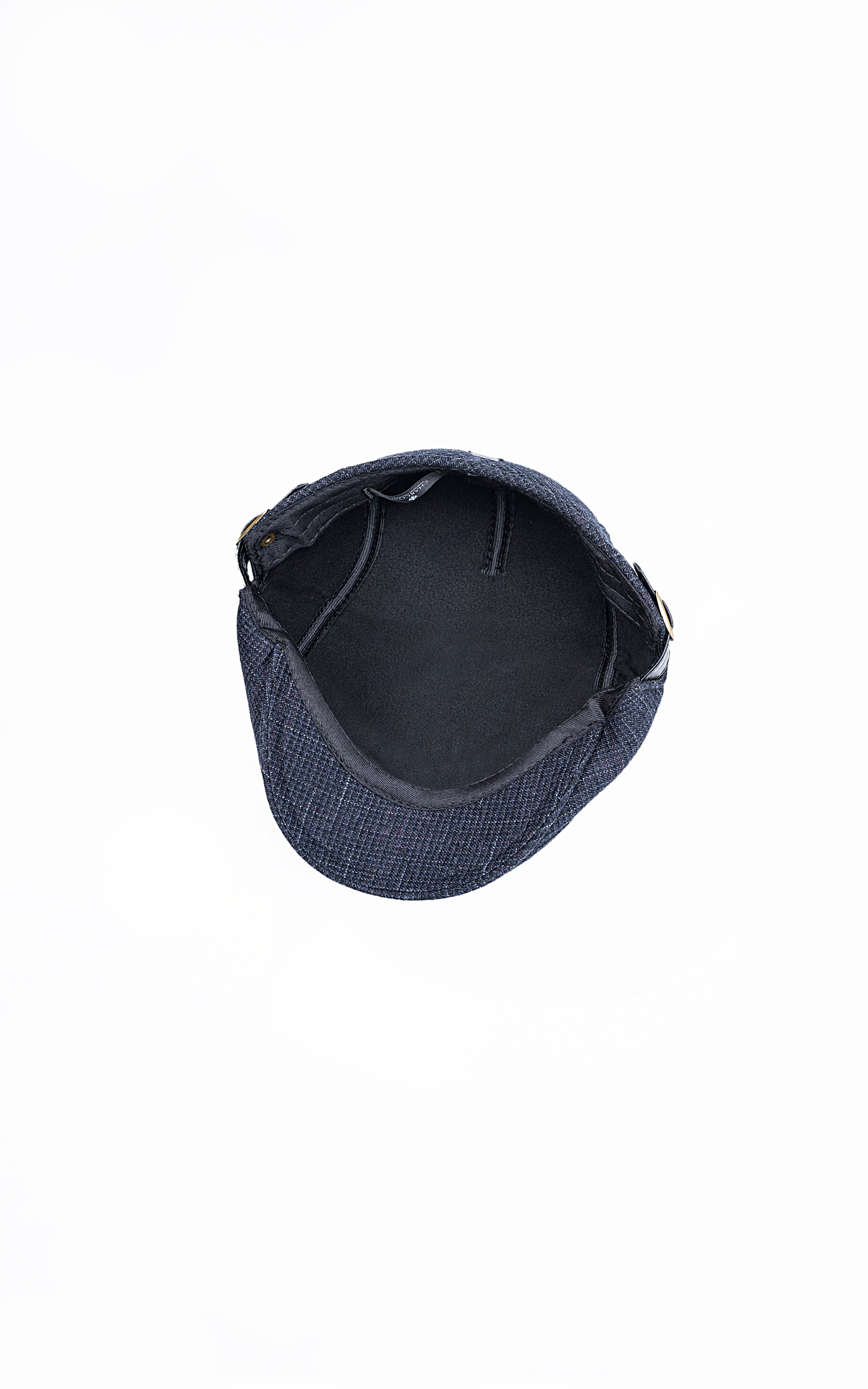 Dark blue golf cap interior with seam stitching and ventilation eyelets
