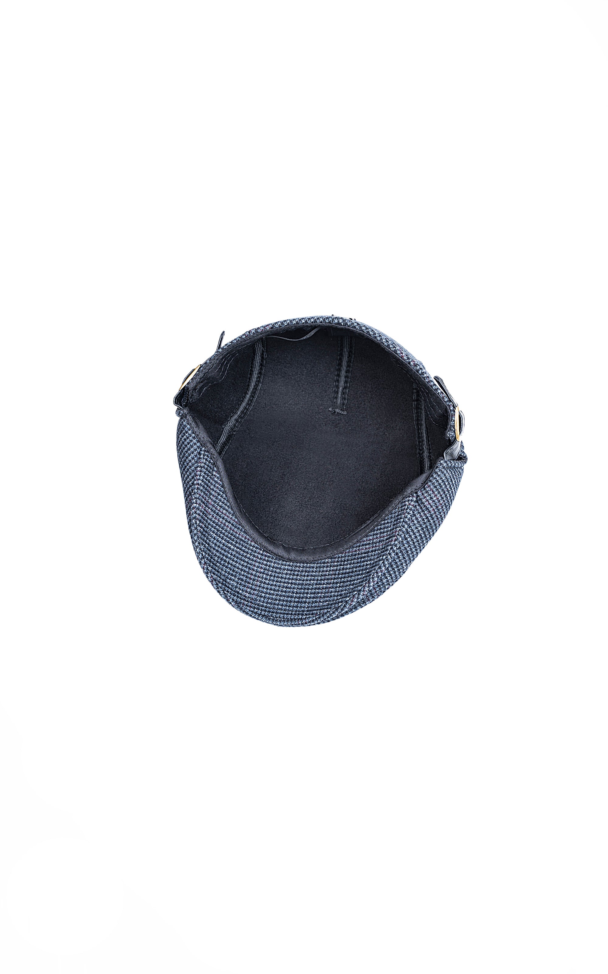 Blue textured golf cap interior lining with adjustable strap loops