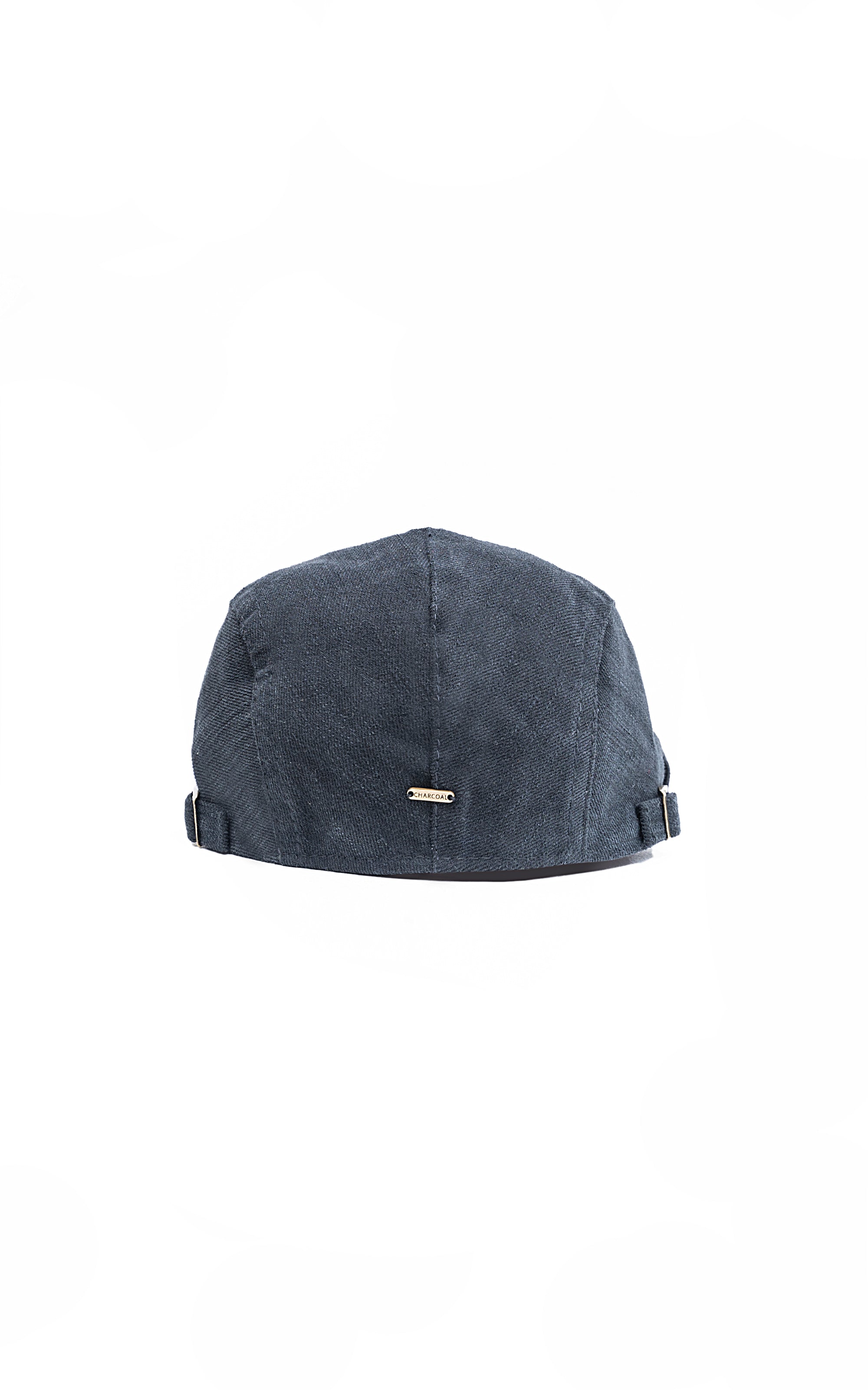 Dark navy golf cap back view with adjustable strap and small gold logo bar.