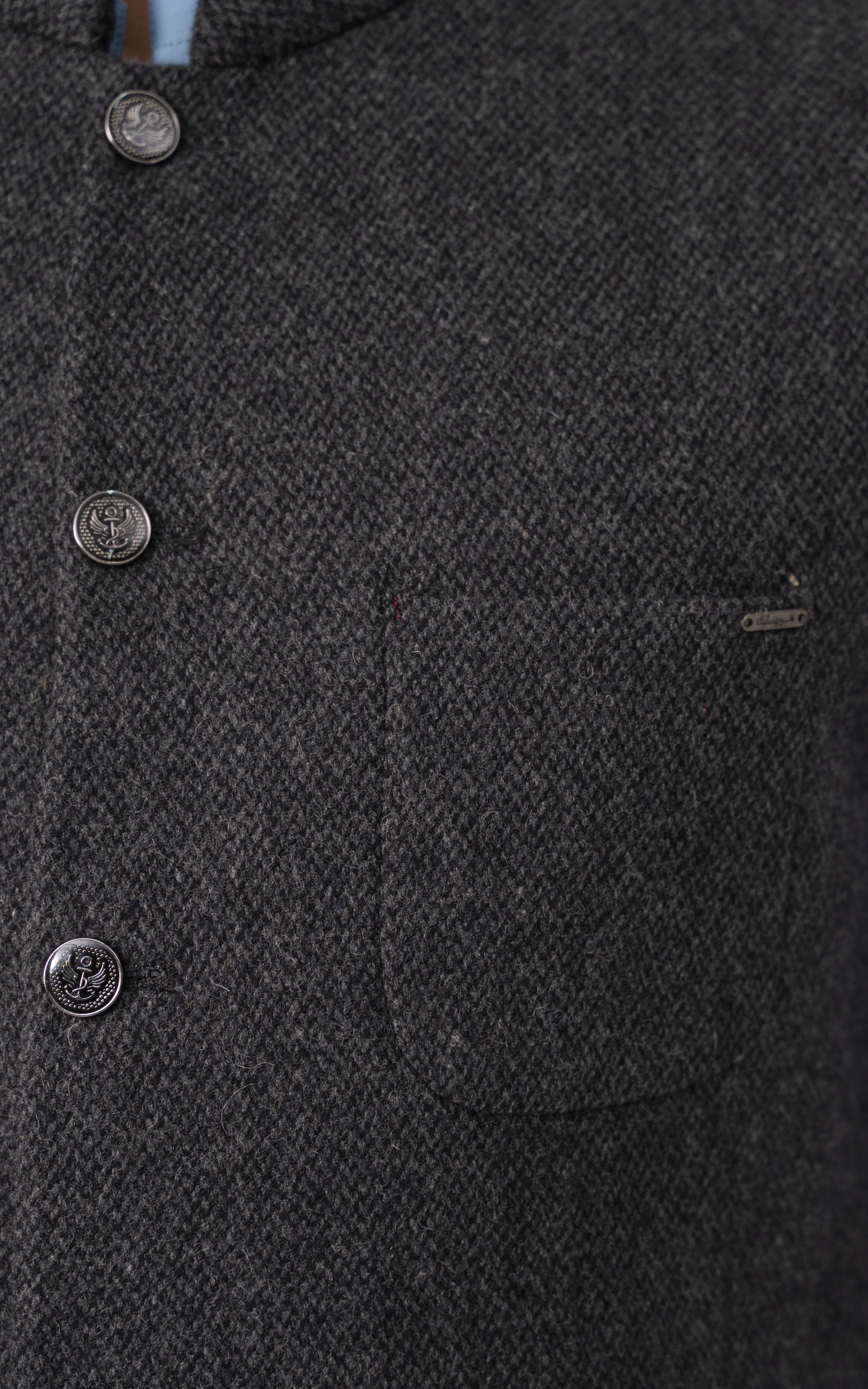 Grey textured wool-blend waistcoat pocket with metal button and logo tab.