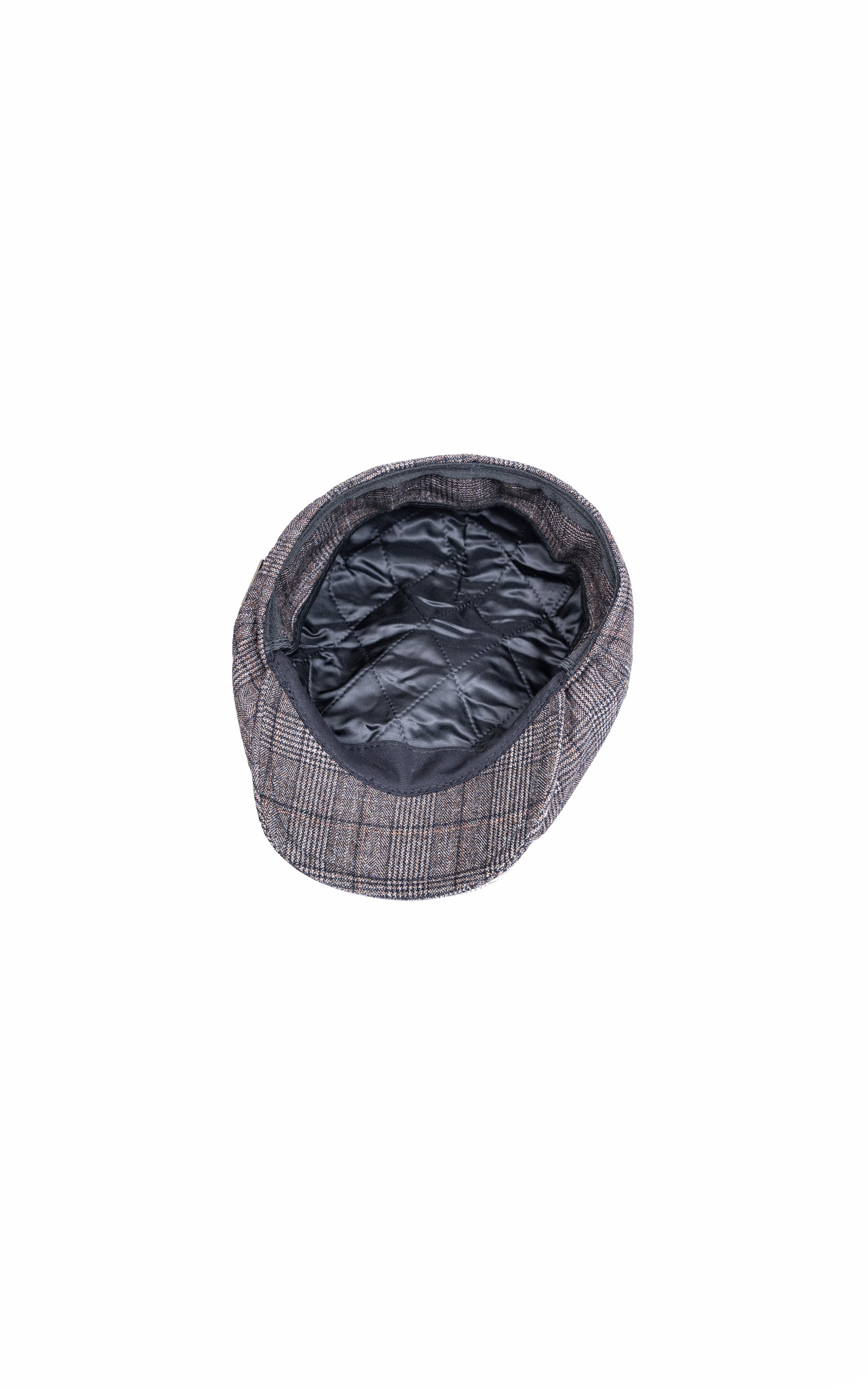 Golf cap with gray plaid outer and dark quilted lining, top view
