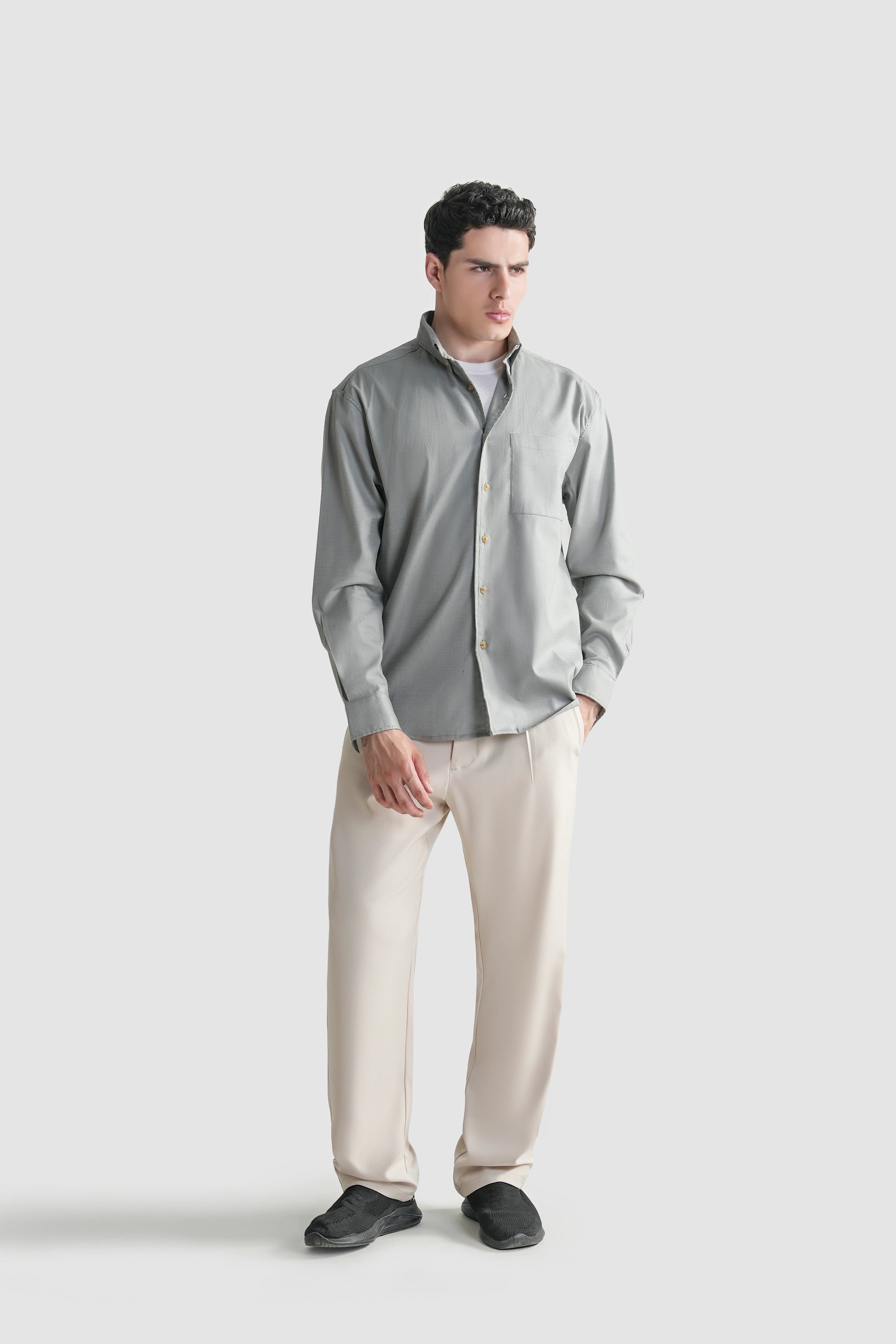 Grey button-down casual shirt with long sleeves and self-textured fabric.