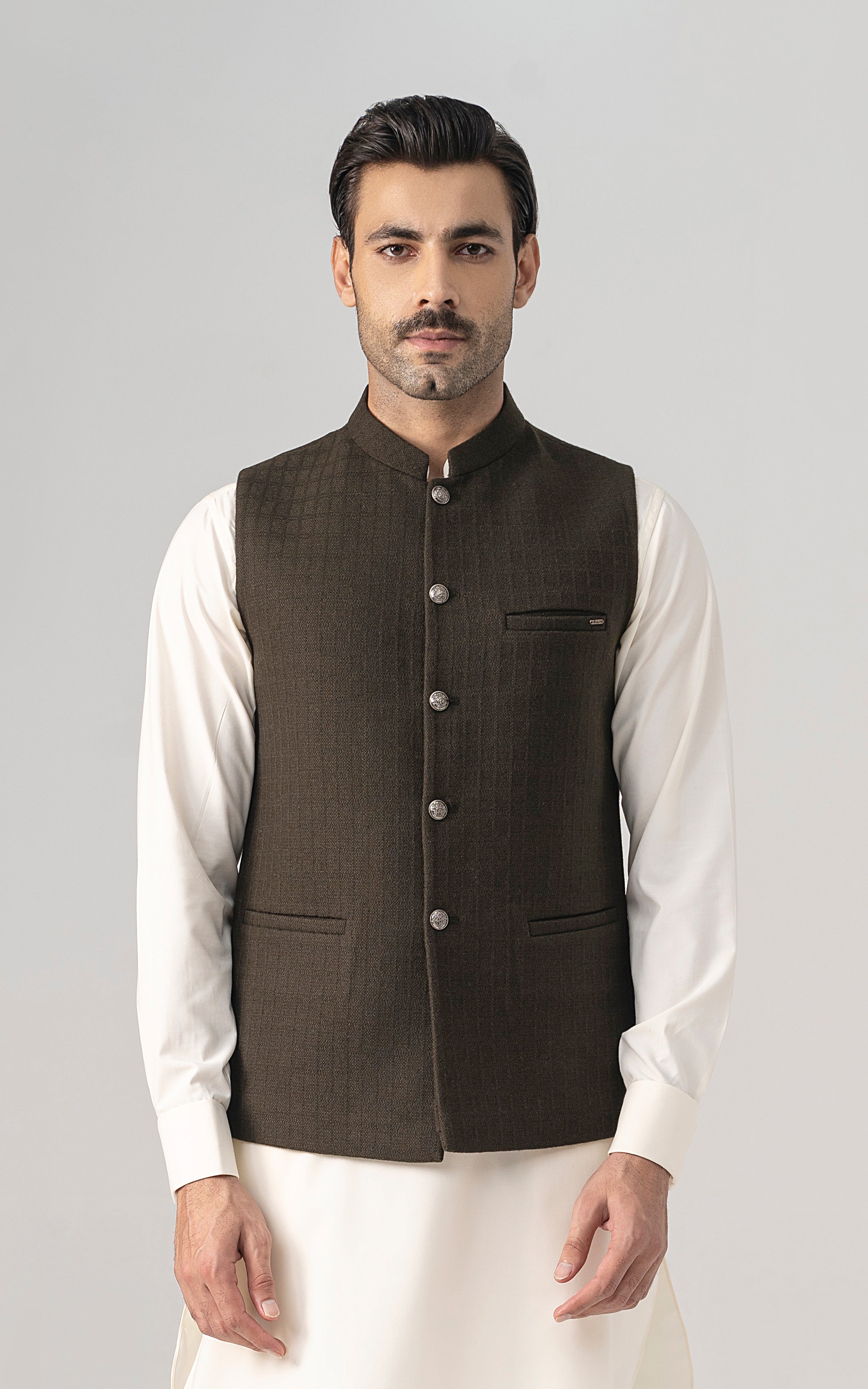 Dark olive textured wool-blend waistcoat with button front and two flap pockets, sleeveless