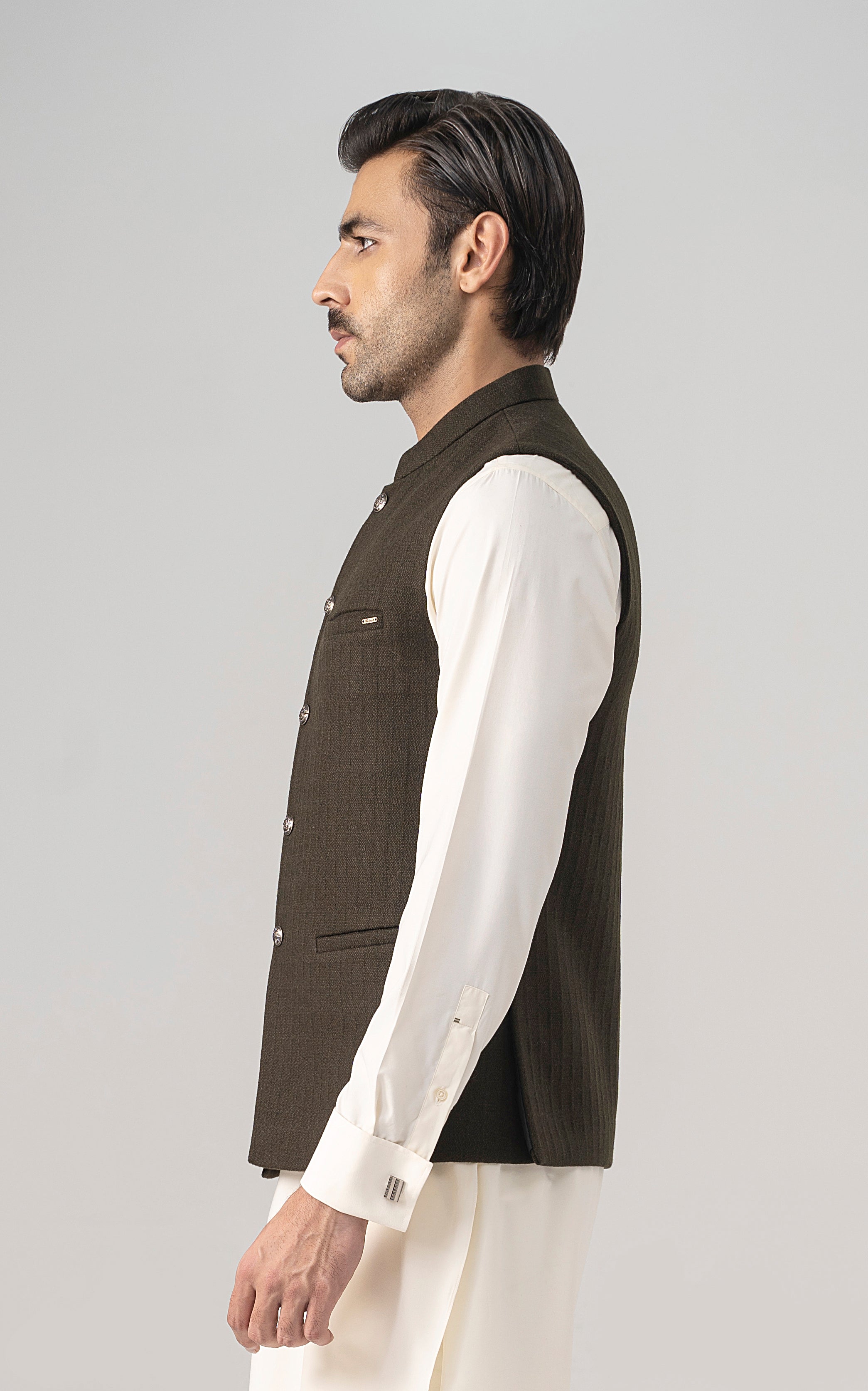 Dark olive textured wool-blend waistcoat, side view, button front and flap pocket