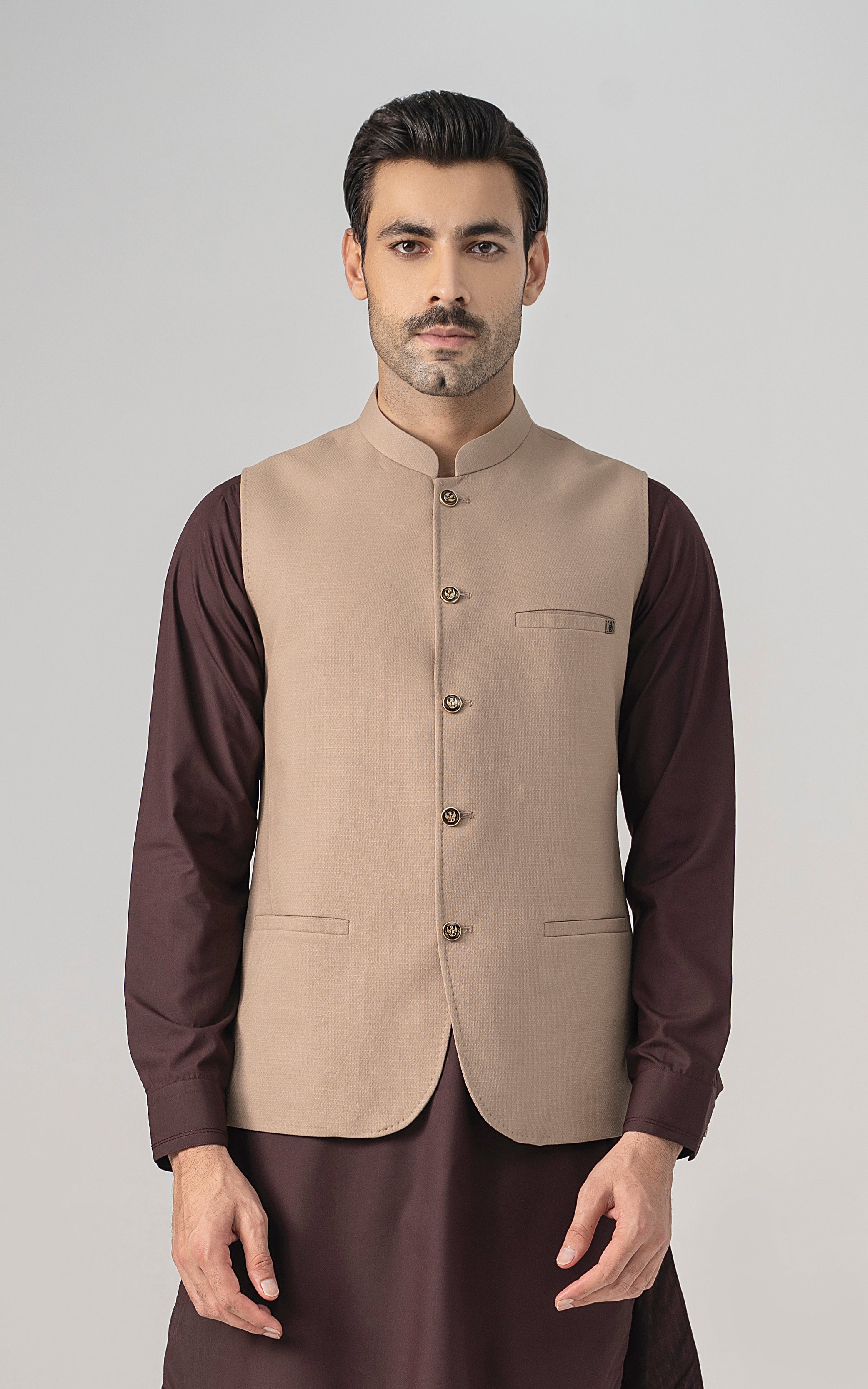 Khaki textured waistcoat with stand collar, gold buttons, and front welt pocket