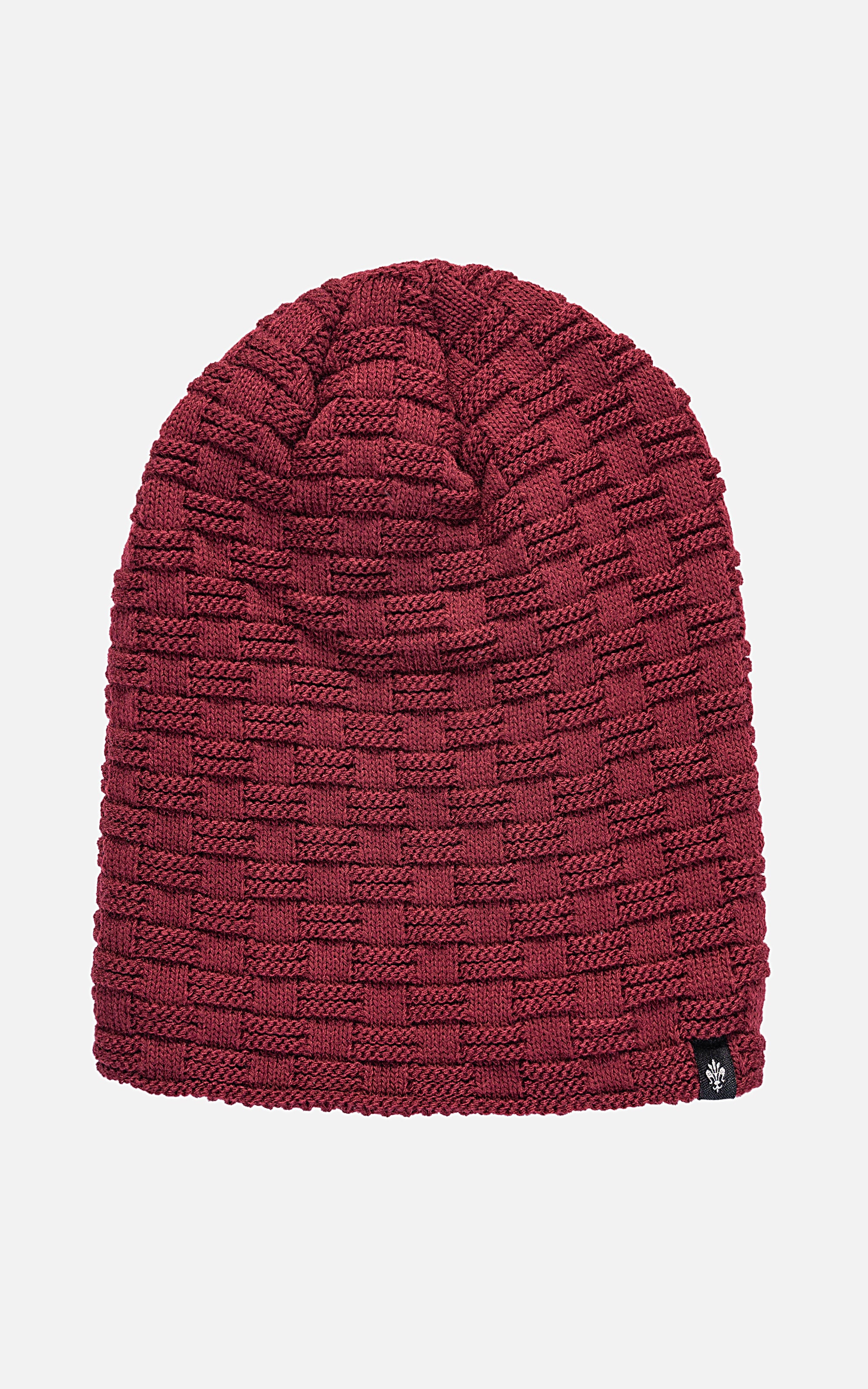 Wool beanie cap in dark maroon with chunky knit pattern and rolled top seam