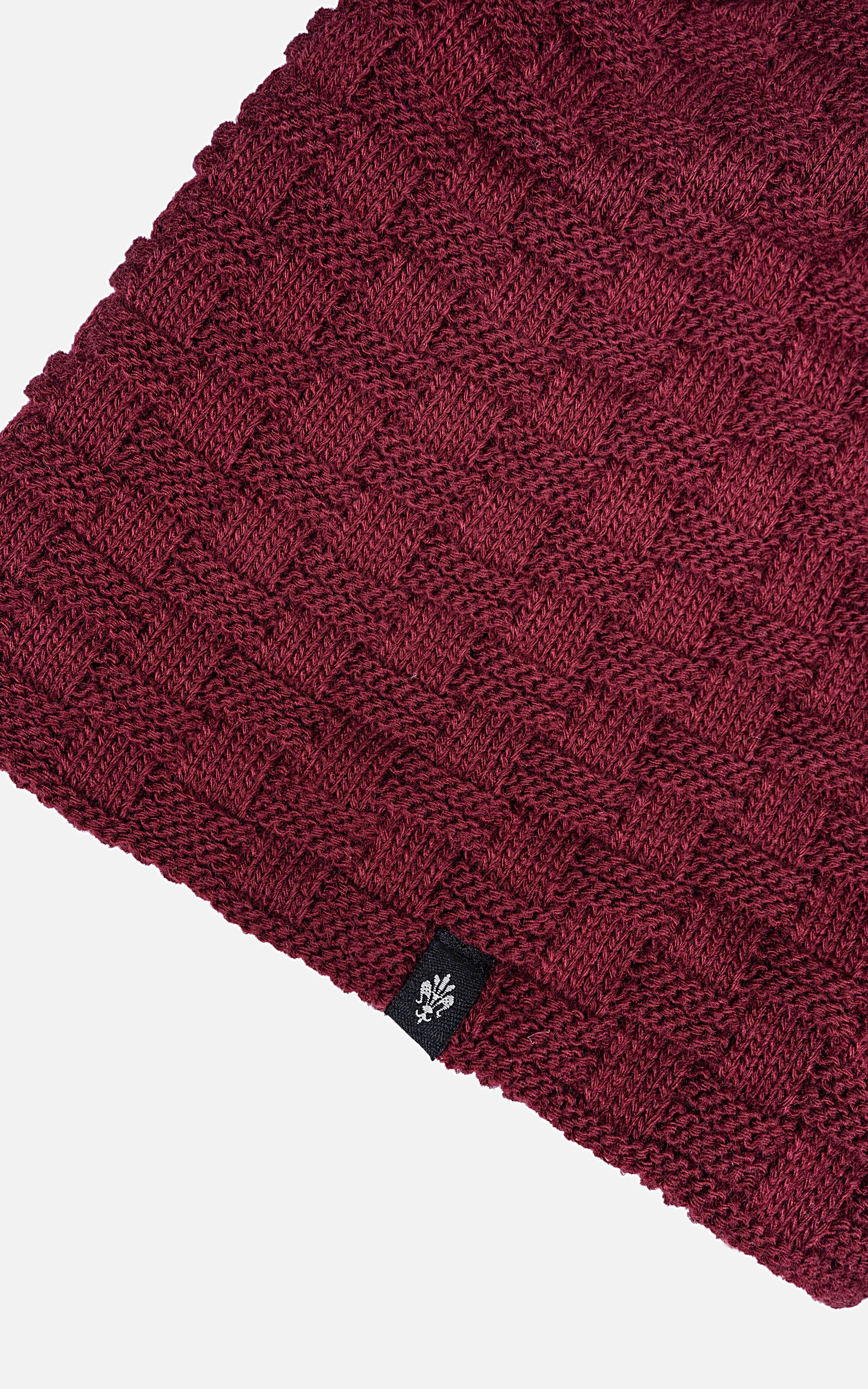 Wool beanie cap in dark maroon knit with ribbed cuff and small logo patch