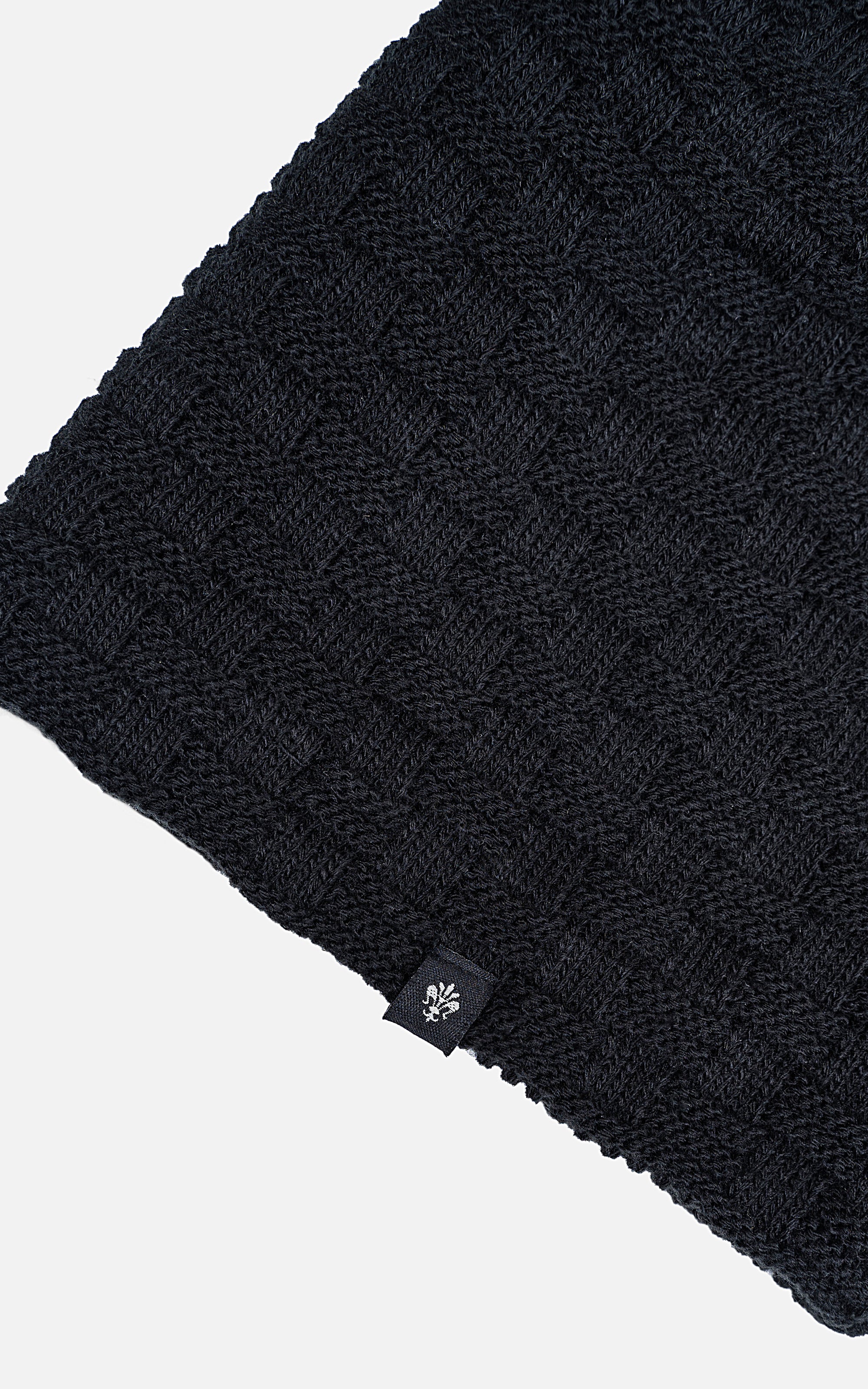 Wool cap knit cuff with small embroidered flower logo, dark color